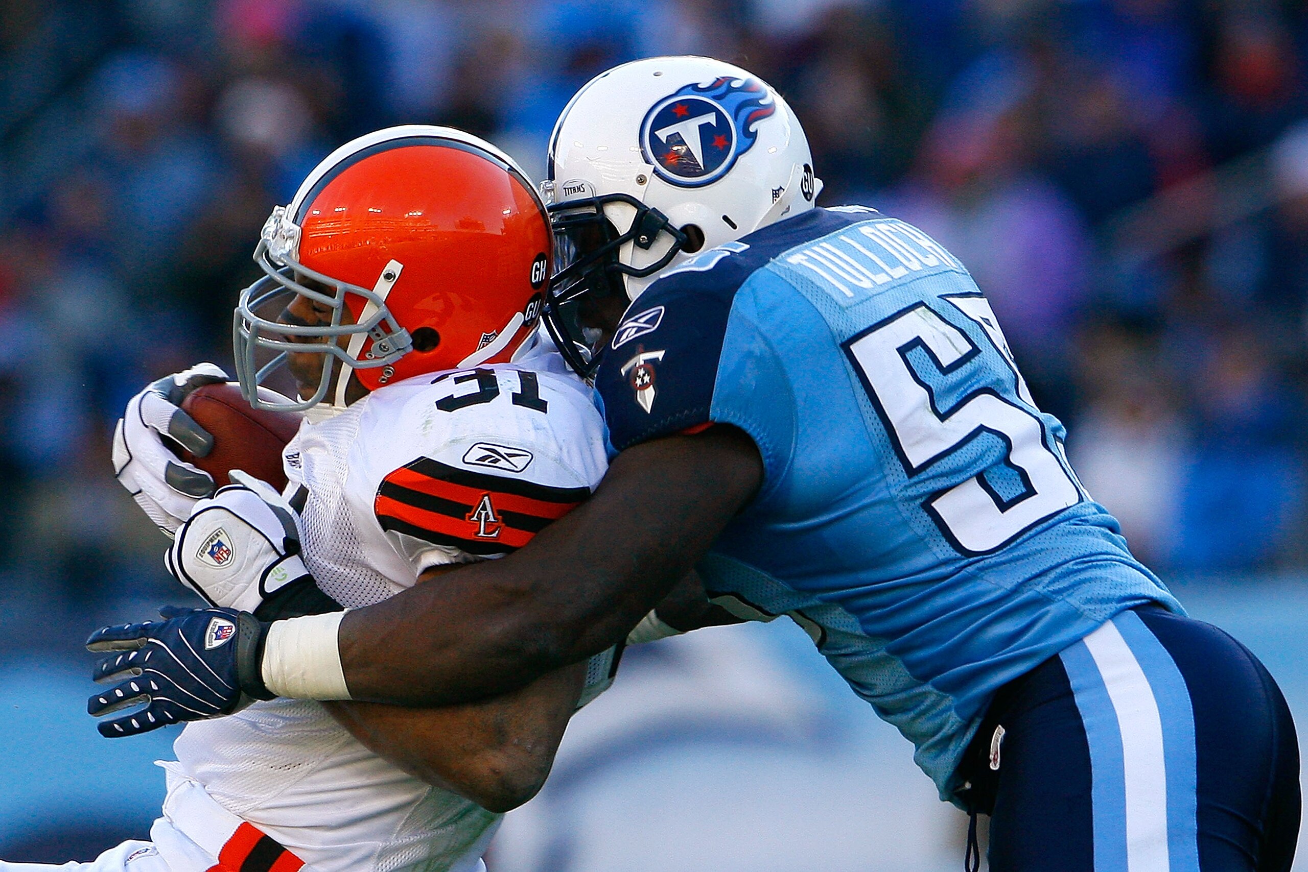 NASHVILLE, TN - DECEMBER 07:  Stephen Tulloch #55 of the Tennessee Titans tackles running back Jamal Lewis #31 of the Cleveland Browns during the game on December 7, 2008 at LP Field in Nashville, Tennessee.  (Photo by Kevin C. Cox/Getty Images)