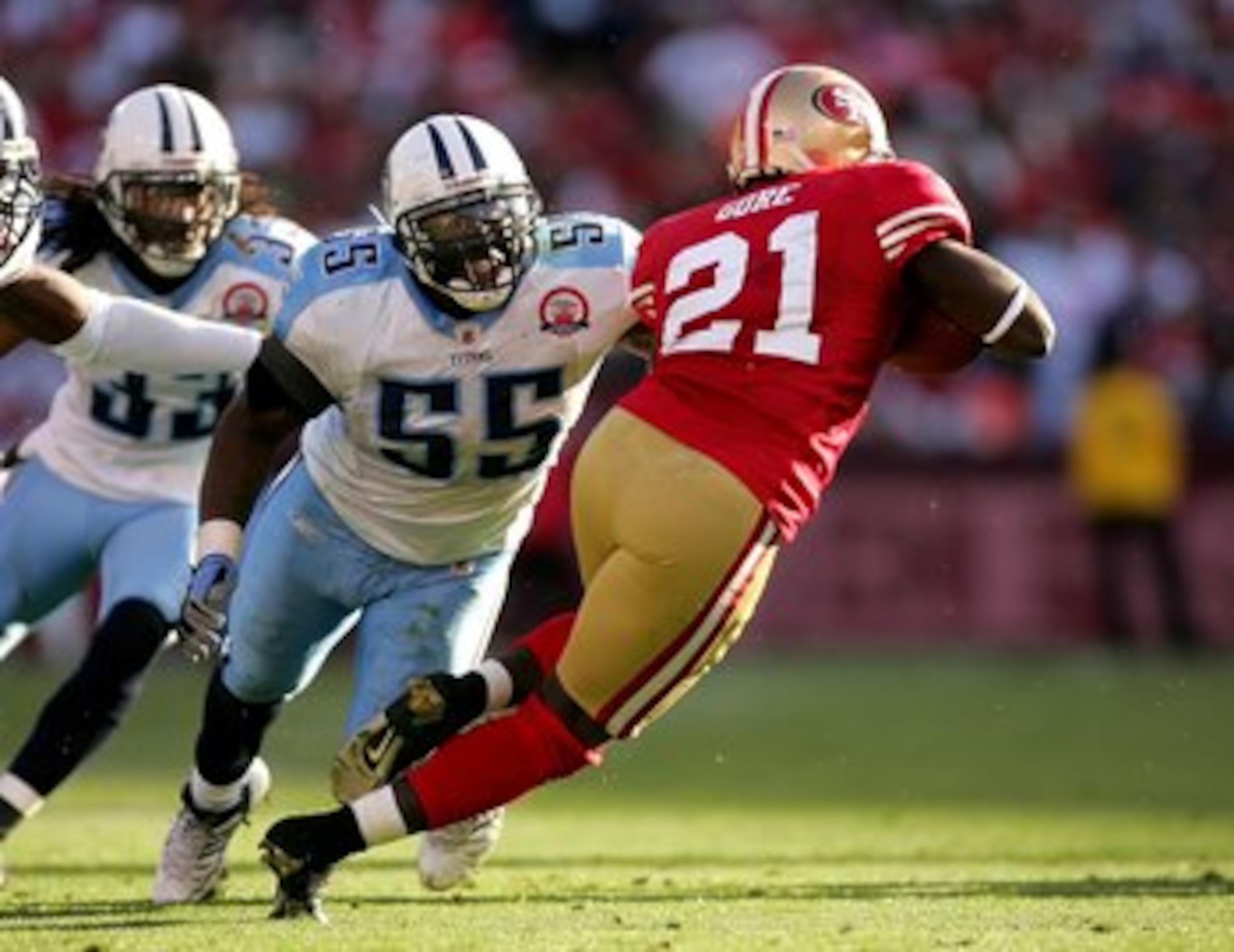 SAN FRANCISCO - NOVEMBER 08: Frank Gore #21 of the San Francisco 49ers is tackled by Stephen Tulloch #55 of the Tennessee Titans at Candlestick Park on November 8, 2009 in San Francisco, California. (Photo by Ezra Shaw/Getty Images) SAN FRANCISCO - NOVEMBER 08: Frank Gore #21 of the San Francisco 49ers is tackled by Stephen Tulloch #55 of the Tennessee Titans at Candlestick Park on November 8, 2009 in San Francisco, California. (Photo by Ezra Shaw/Getty Images)