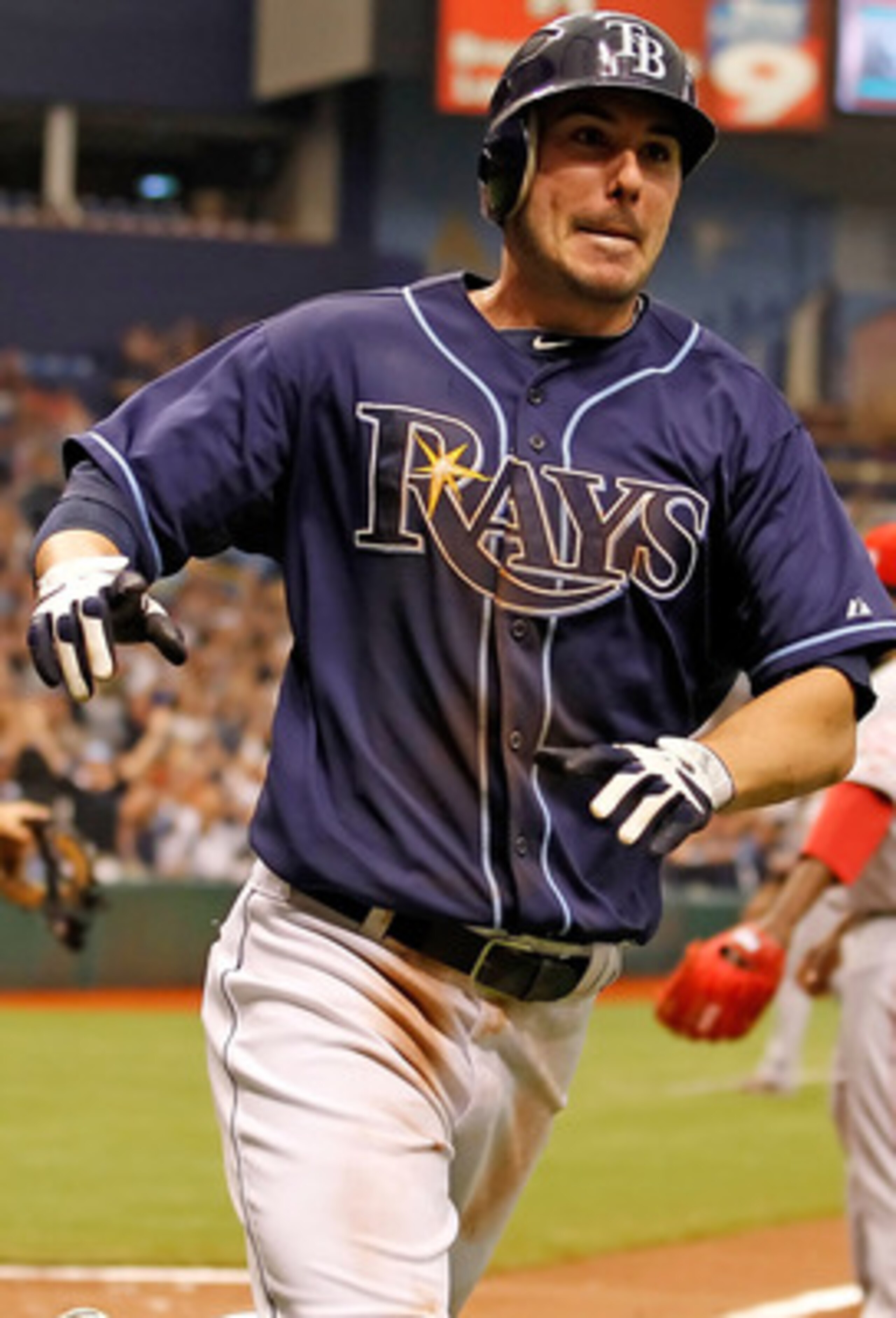 ST. PETERSBURG, FL - APRIL 30:  Outfielder Matt Joyce #20 of the Tampa Bay Rays scores the game winning run in the tenth inning against the Los Angeles Angels of Anaheim at Tropicana Field on April 30, 2011 in St. Petersburg, Florida.  (Photo by J. Meric/