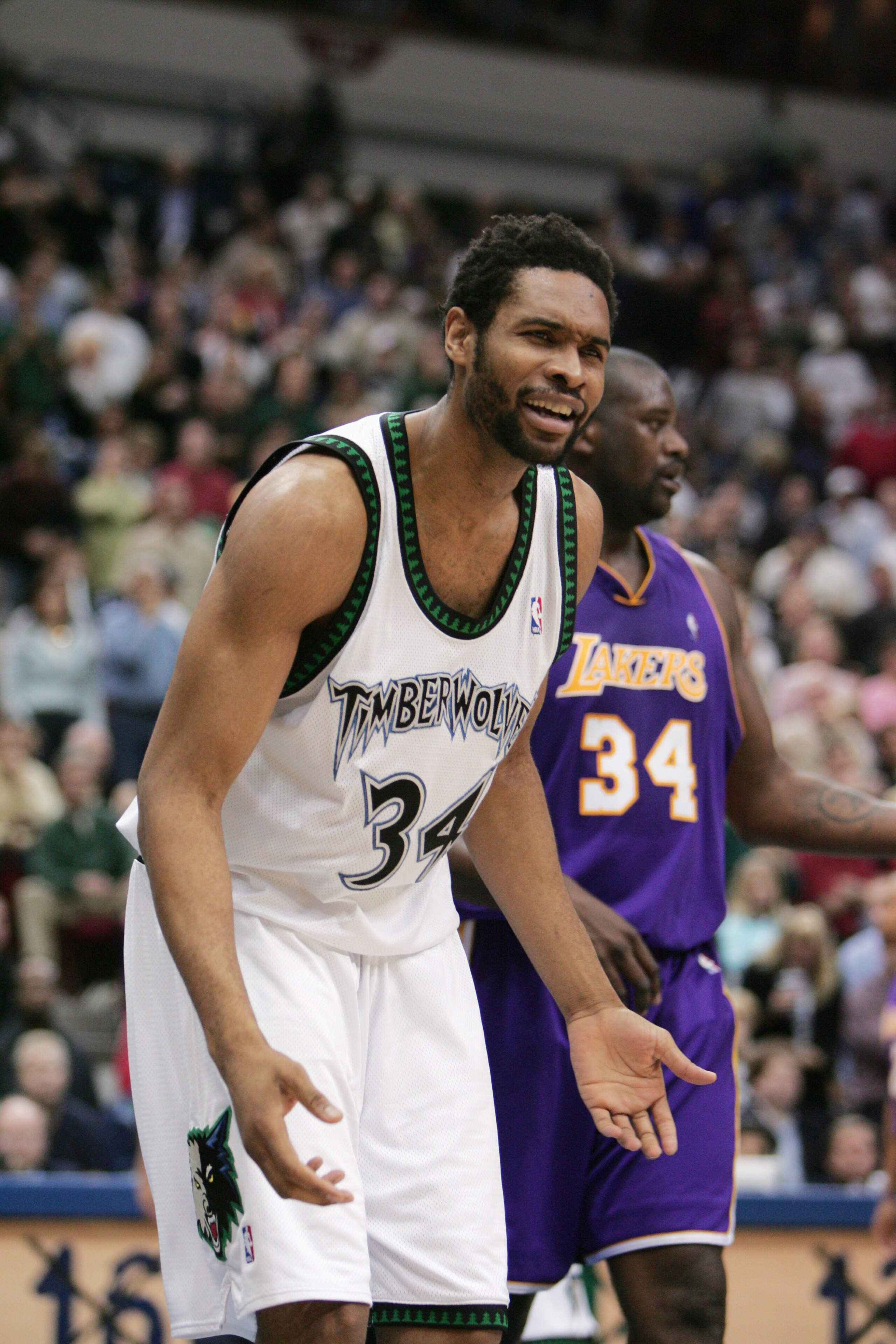 MINNEAPOLIS - MAY 23:  Michael Olowokandi #34 of the Minnesota Timberwolves reacts after the play against the Los Angeles Lakers in Game two of the Western Conference Finals during the 2004 NBA Playoffs at Target Center on May 23, 2004 in Minneapolis, Min