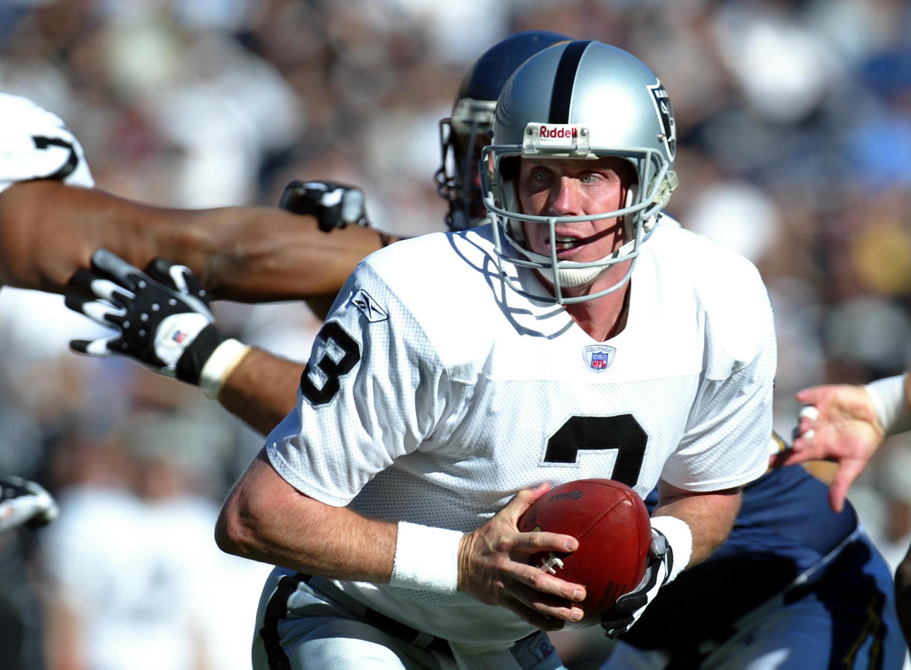 SAN DIEGO - DECEMBER 28:  Quarterback Rick Mirer #3 of the Oakland Raiders in action against the San Diego Chargers in the 1st half  during their NFL game on December 28, 2003 at Qualcomm Stadium in San Diego, California.  (Photo by Donald Miralle/Getty I
