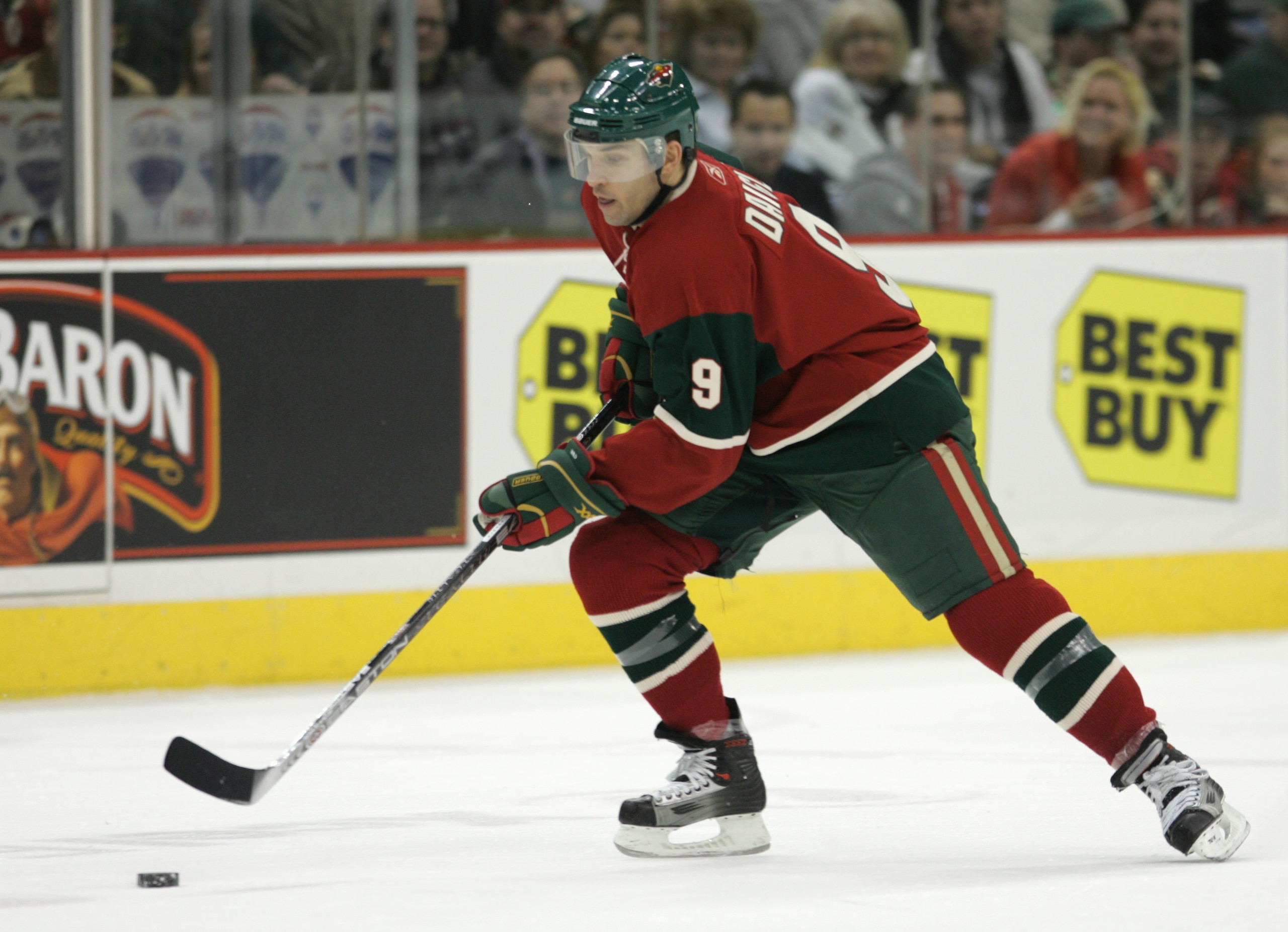 SAINT PAUL - JANUARY 9: Alexandre Daigle #9 of the Minnesota Wild skates with the puck during the game against the Dallas Stars at the Xcel Energy Center on January 9, 2006 in Saint Paul, Minnesota. The Stars won 2-1. (Photo by Bruce Bennett/Getty Images)