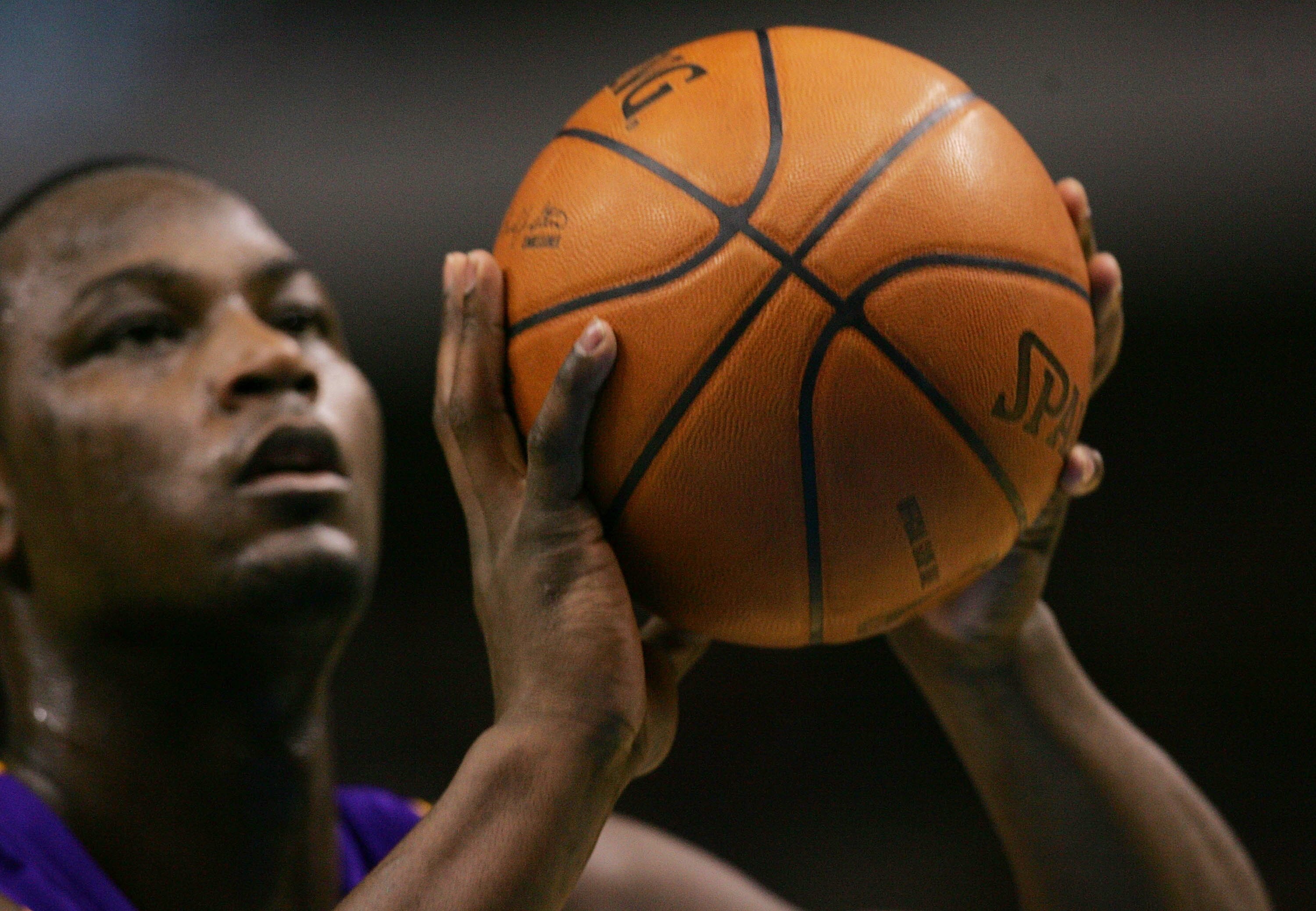 DALLAS - JANUARY 25:  Center Kwame Brown #54 of the Los Angeles Lakers grips the ball as he takes a free throw against the Dallas Mavericks on January 25, 2008 at American Airlines Center in Dallas, Texas.  NOTE TO USER: User expressly acknowledges and ag