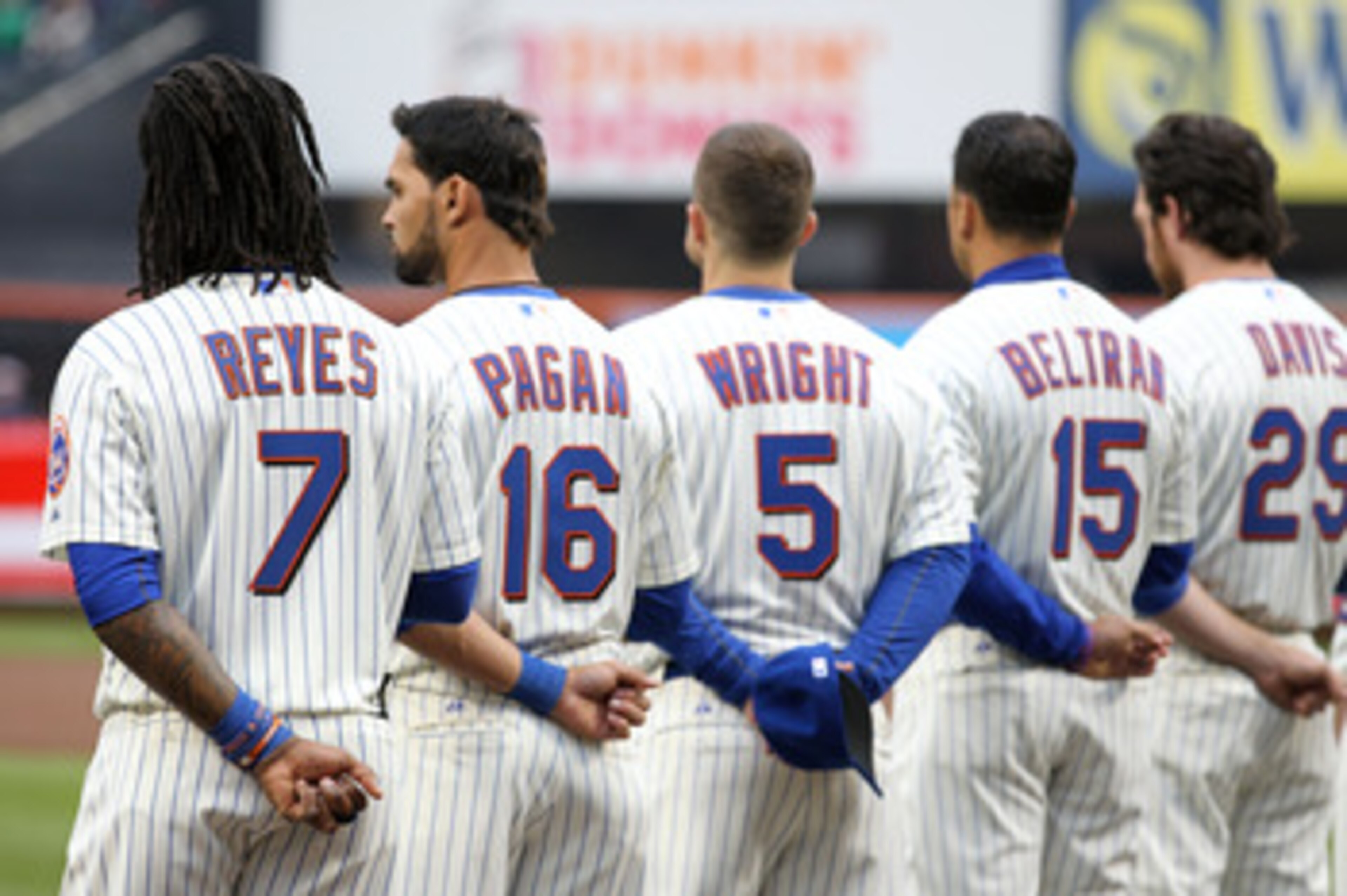 NEW YORK, NY - APRIL 08:  (L-R) Jose Reyes #7, Angel Pagan #16, David Wright #5, Carlos Beltran #15 and Ike Davis #29 of the New York Mets line up during pregame festivities against the Washington Nationals during the Mets' Home Opener at Citi Field on Ap