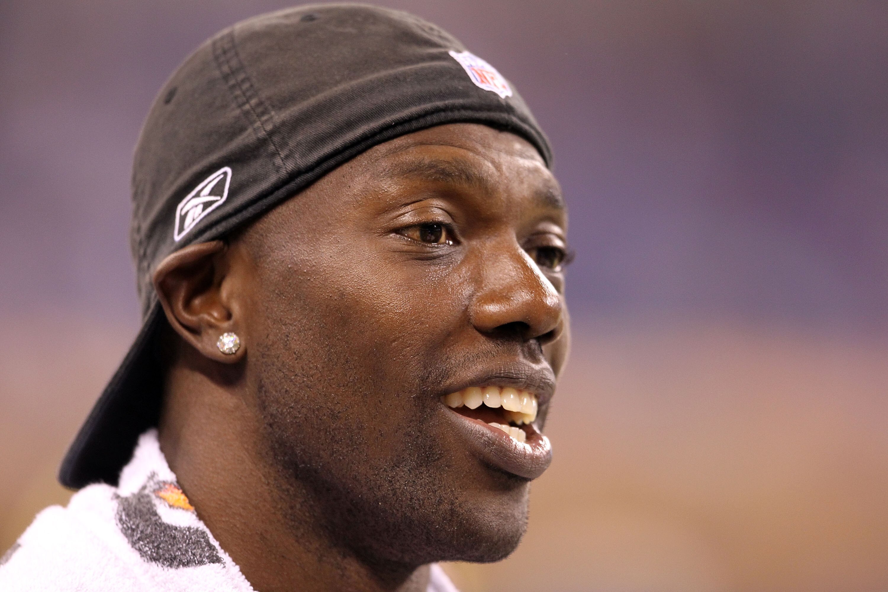 INDIANAPOLIS - SEPTEMBER 02:  Terrell Owens #81  of the Cincinnati Bengals watches from the sidelines during the NFL preseason game against the Indianapolis Colts at Lucas Oil Stadium on September 2, 2010 in Indianapolis, Indiana.  (Photo by Andy Lyons/Ge