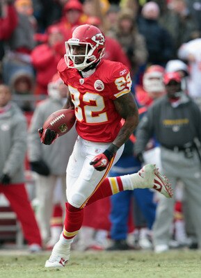 KANSAS CITY, MO - DECEMBER 26:  Receiver Dwayne Bowe #82 of the Kansas City Chiefs carries the ball after making a catch on a 75 yard touchdown play during the game against the Tennessee Titans on December 26, 2010 at Arrowhead Stadium in Kansas City, Mis