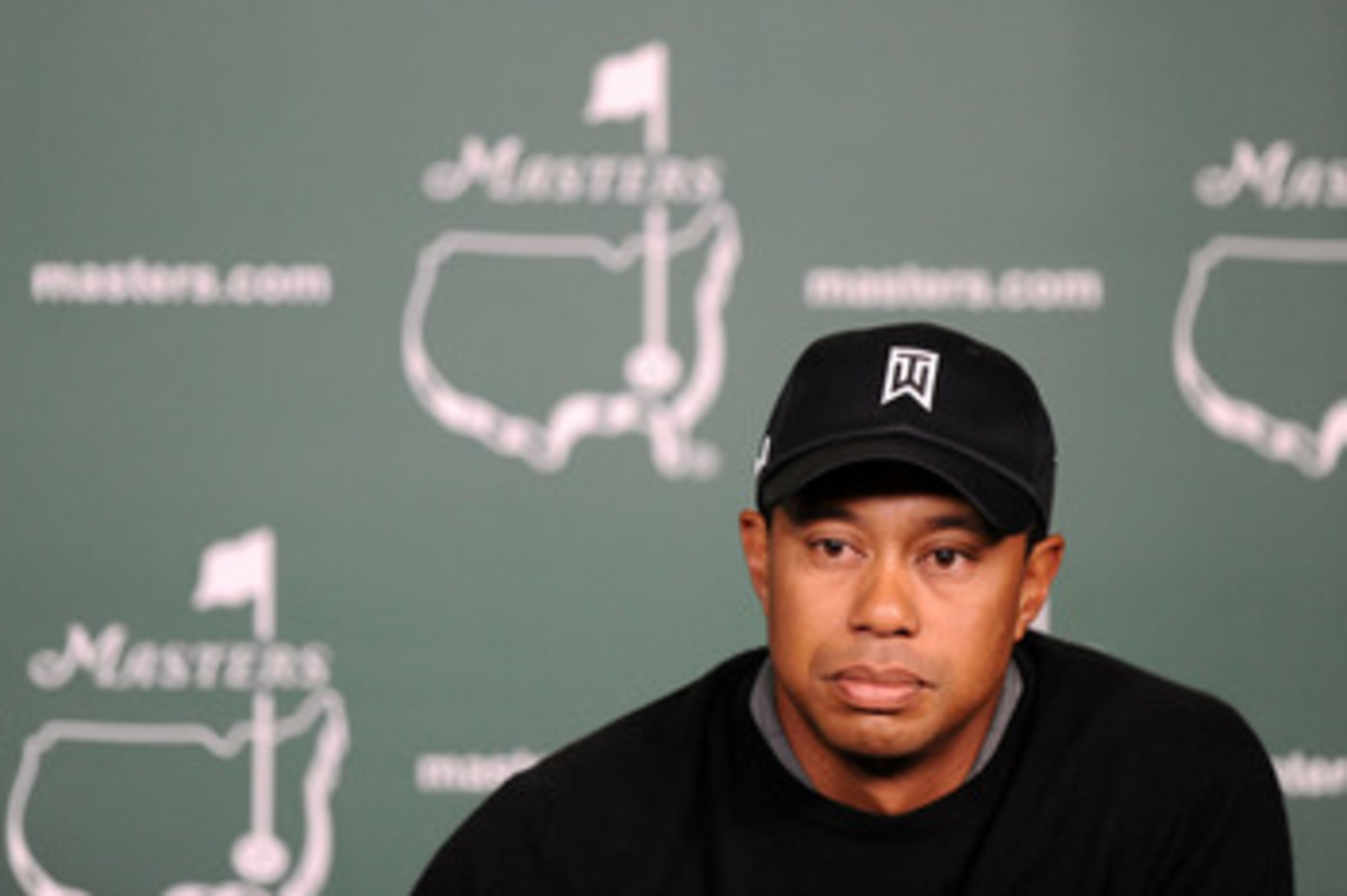 AUGUSTA, GA - APRIL 05:  Tiger Woods speaks to the media during a press conference during a practice round prior to the 2011 Masters Tournament at Augusta National Golf Club on April 5, 2011 in Augusta, Georgia.  (Photo by Harry How/Getty Images)