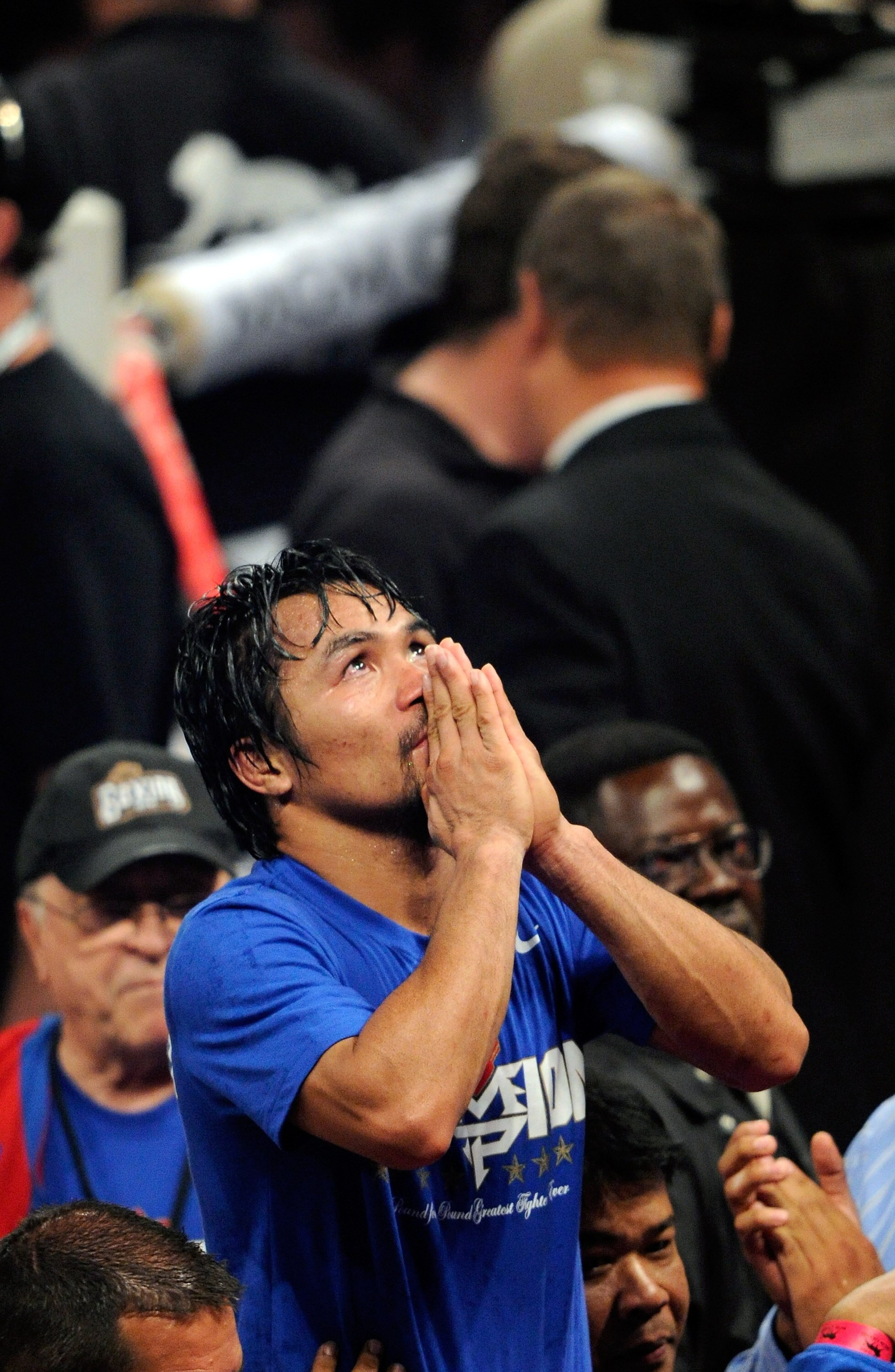LAS VEGAS, NV - MAY 07:  Boxer Manny Pacquiao reacts at the end of his WBO welterweight title fight against Shane Mosley at the MGM Grand Garden Arena May 7, 2011 in Las Vegas, Nevada. Pacquiao retained his title by unanimous decision.  (Photo by Ethan Mi