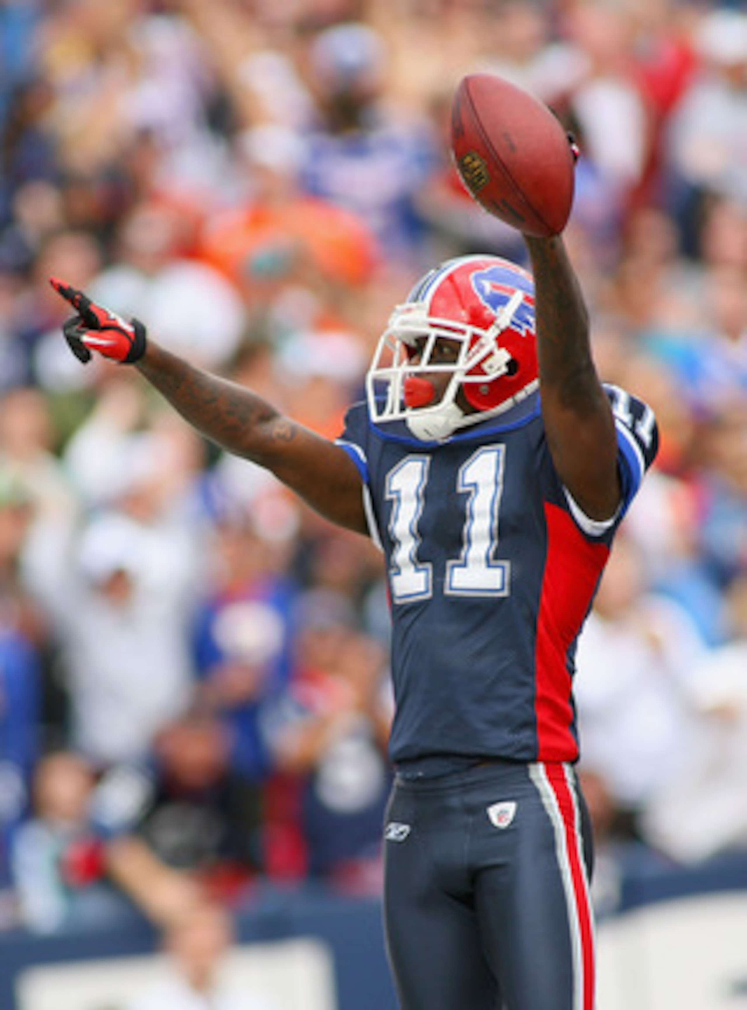 ORCHARD PARK, NY - SEPTEMBER 12:  Roscoe Parrish #11 of the Buffalo Bills celebrates his 31 yard touchdown catch against the Miami Dolphins during the NFL season opener at Ralph Wilson Stadium on September 12, 2010 in Orchard Park, New York. Miami won 15-