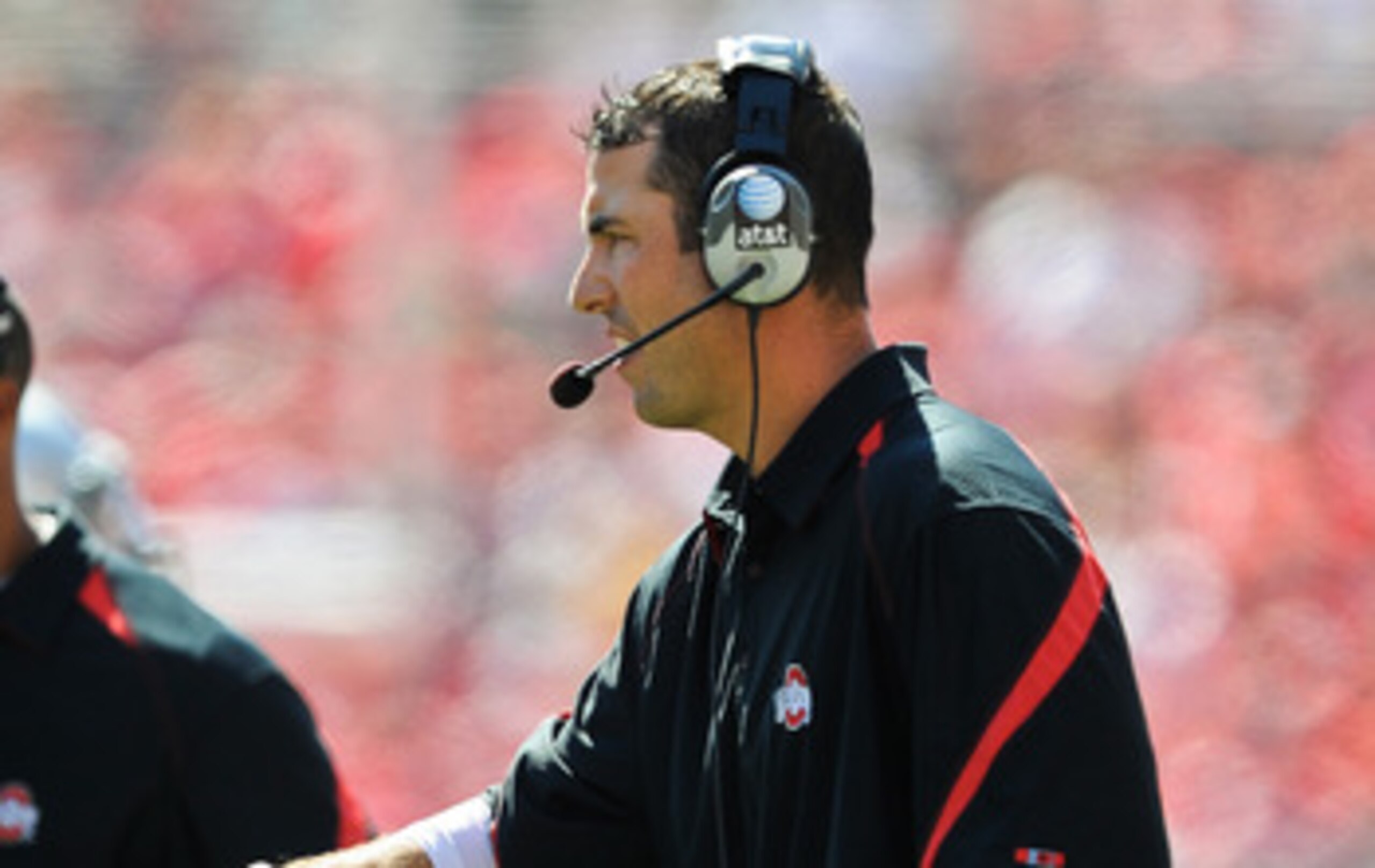 COLUMBUS, OH - SEPTEMBER 18:  Assistant Coach Luke Fickell of the Ohio State Buckeyes fists pump one of his players during a game against the Ohio Bobcats at Ohio Stadium on September 18, 2010 in Columbus, Ohio.  (Photo by Jamie Sabau/Getty Images)