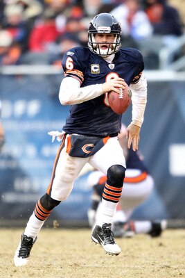 CHICAGO, IL - JANUARY 16:  Quarterback Jay Cutler #6 of the Chicago Bears runs the ball against the Seattle Seahawks in the second quarter of the 2011 NFC divisional playoff game at Soldier Field on January 16, 2011 in Chicago, Illinois.  (Photo by Andy L