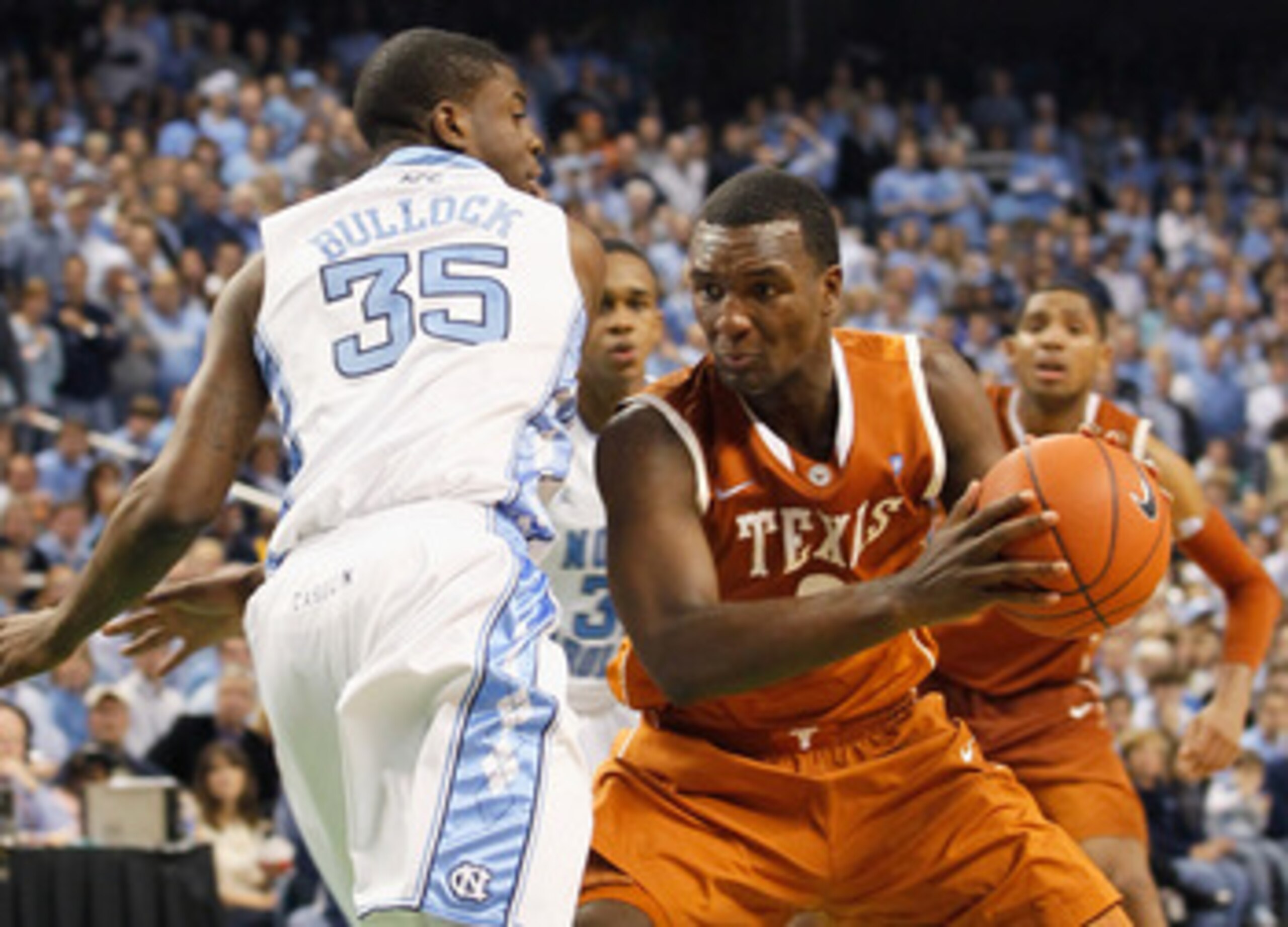 GREENSBORO, NC - DECEMBER 18:  Jordan Hamilton #3 of the Texas Longhorns against Reggie Bullock #35 of the North Carolina Tar Heels at Greensboro Coliseum on December 18, 2010 in Greensboro, North Carolina.  (Photo by Kevin C. Cox/Getty Images)