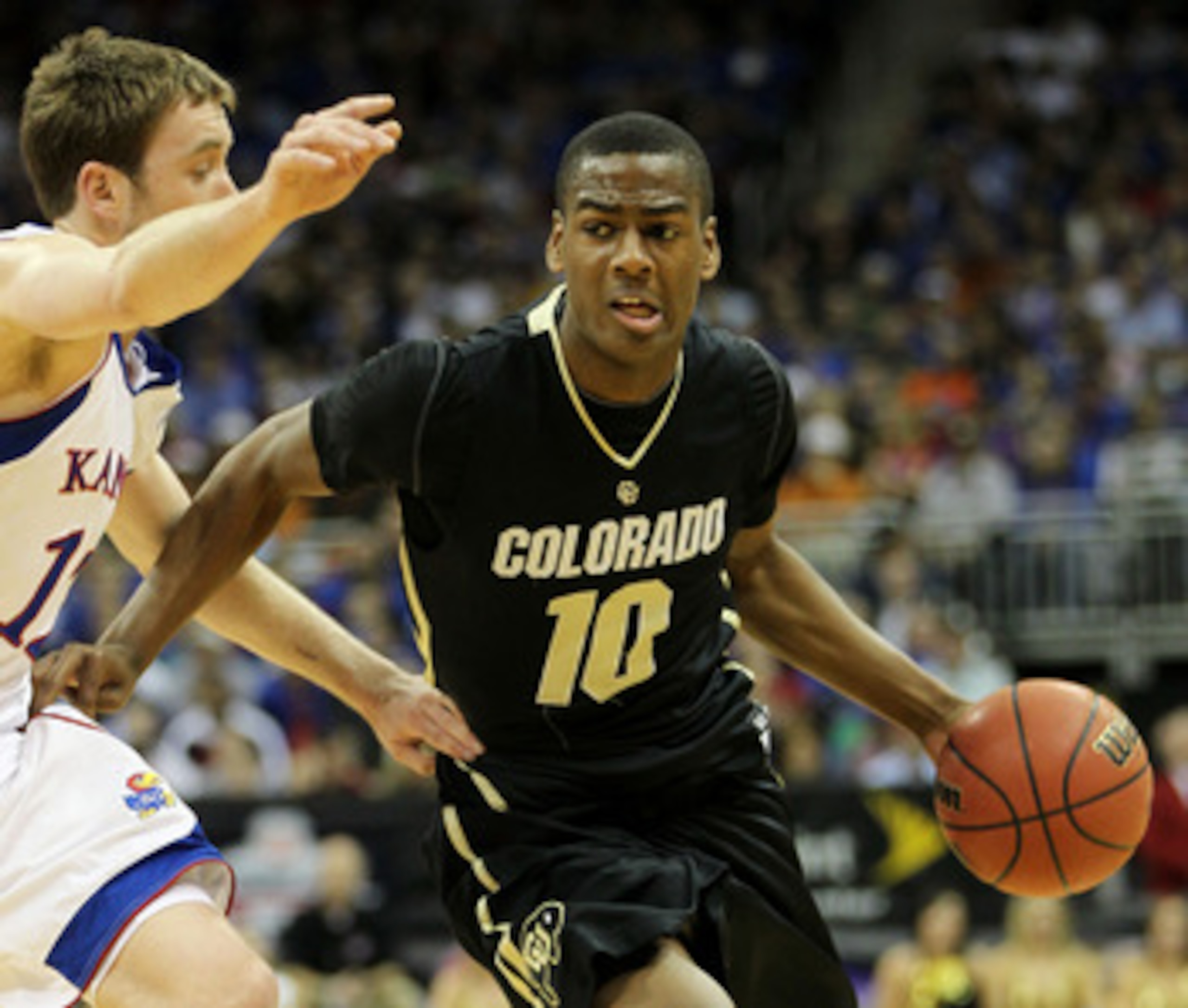 KANSAS CITY, MO - MARCH 11:  Alec Burks #10 of the Colorado Buffaloes drives with the ball against the Kansas Jayhawks during their semifinal game in the 2011 Phillips 66 Big 12 Men's Basketball Tournament at Sprint Center on March 11, 2011 in Kansas City