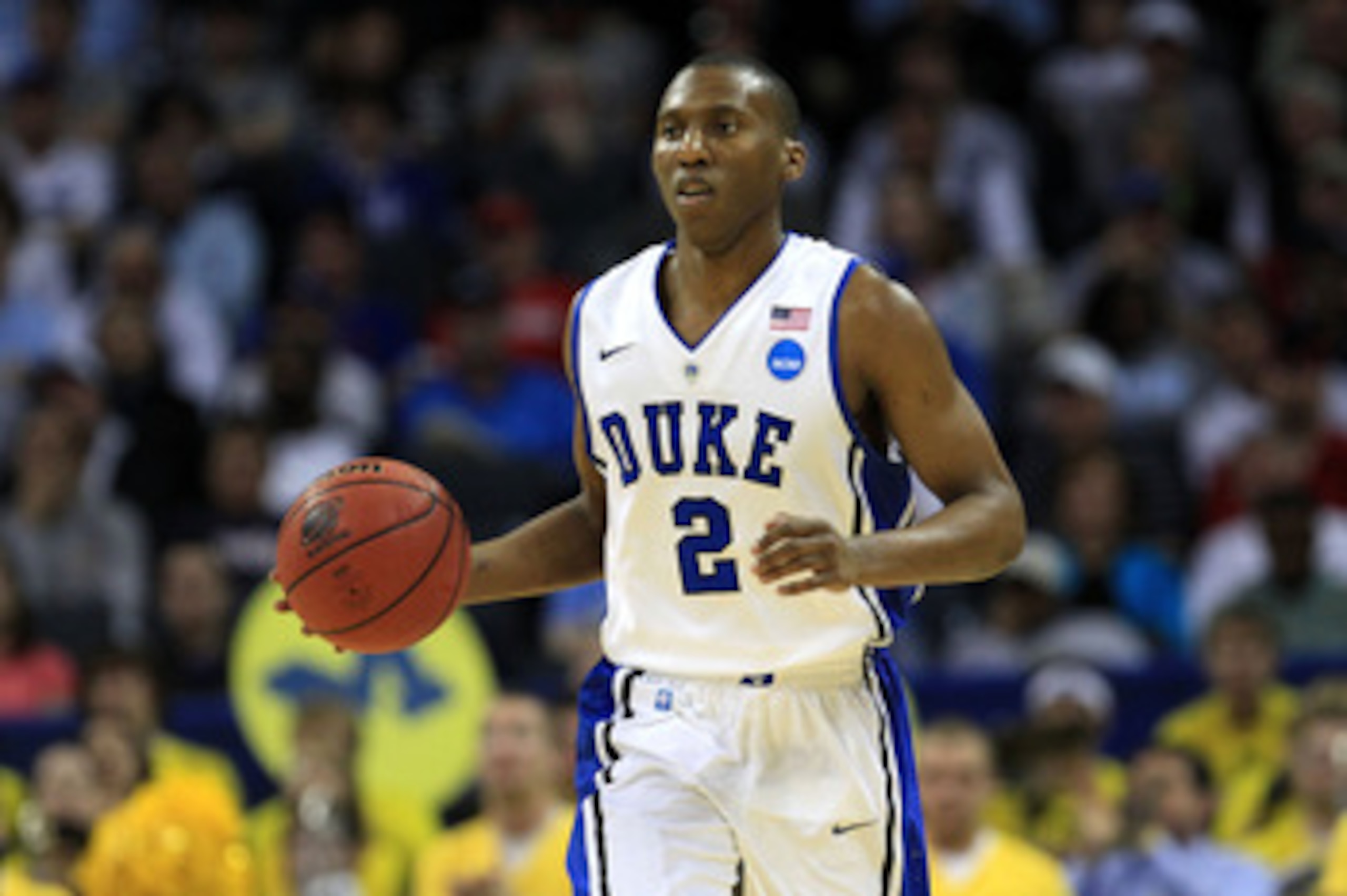 CHARLOTTE, NC - MARCH 20:  Nolan Smith #2 of the Duke Blue Devils moves the ball upcourt while taking on the Michigan Wolverines during the third round of the 2011 NCAA men's basketball tournament at Time Warner Cable Arena on March 20, 2011 in Charlotte,