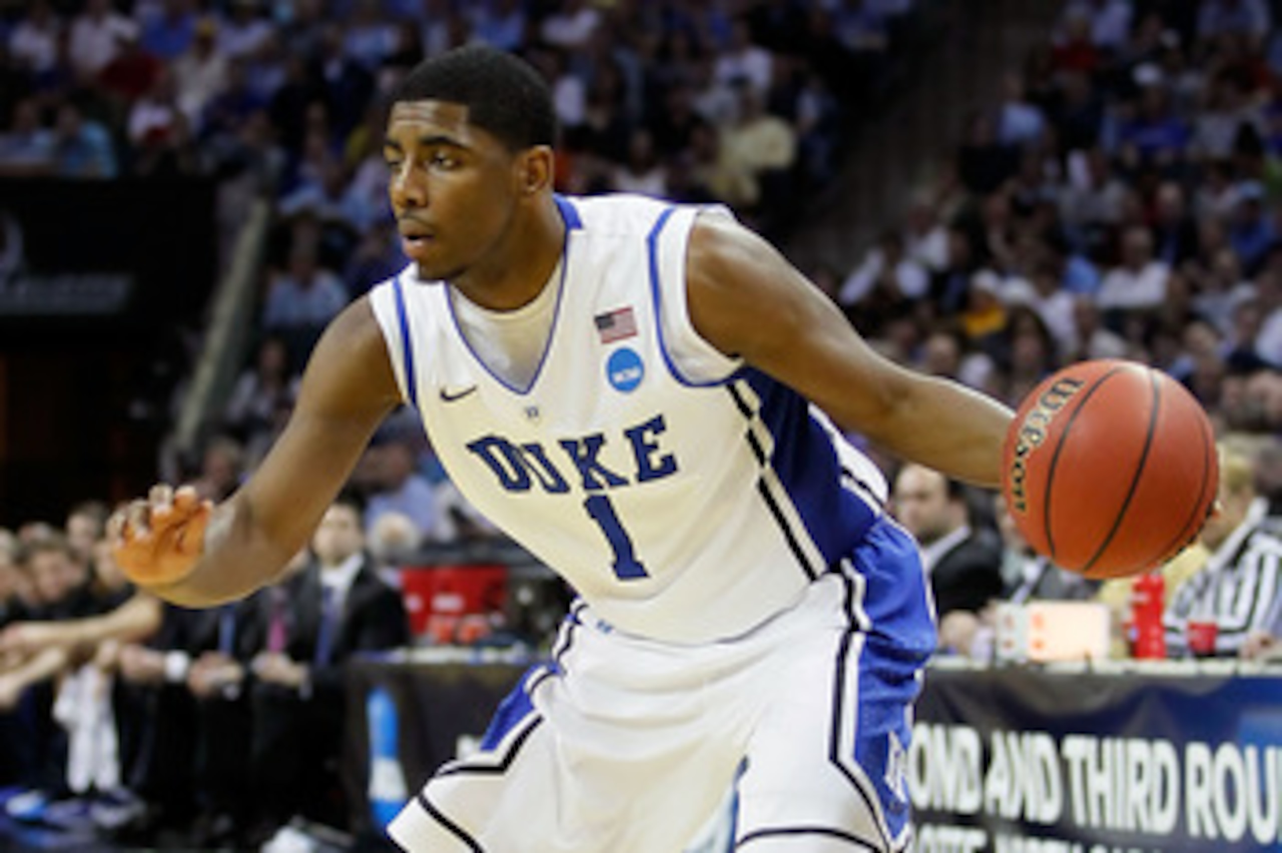 CHARLOTTE, NC - MARCH 20:  Kyrie Irving #1 of the Duke Blue Devils moves the ball while taking on the Michigan Wolverines during the third round of the 2011 NCAA men's basketball tournament at Time Warner Cable Arena on March 20, 2011 in Charlotte, North