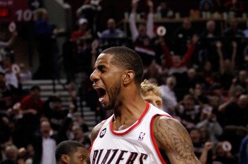 PORTLAND, OR - APRIL 21:  LaMarcus Aldridge #12 of the Portland Trail Blazers celebrates a dunk against the Dallas Mavericks in Game Three of the Western Conference Quarterfinals in the 2011 NBA Playoffs on April 21, 2011 at the Rose Garden in Portland, O