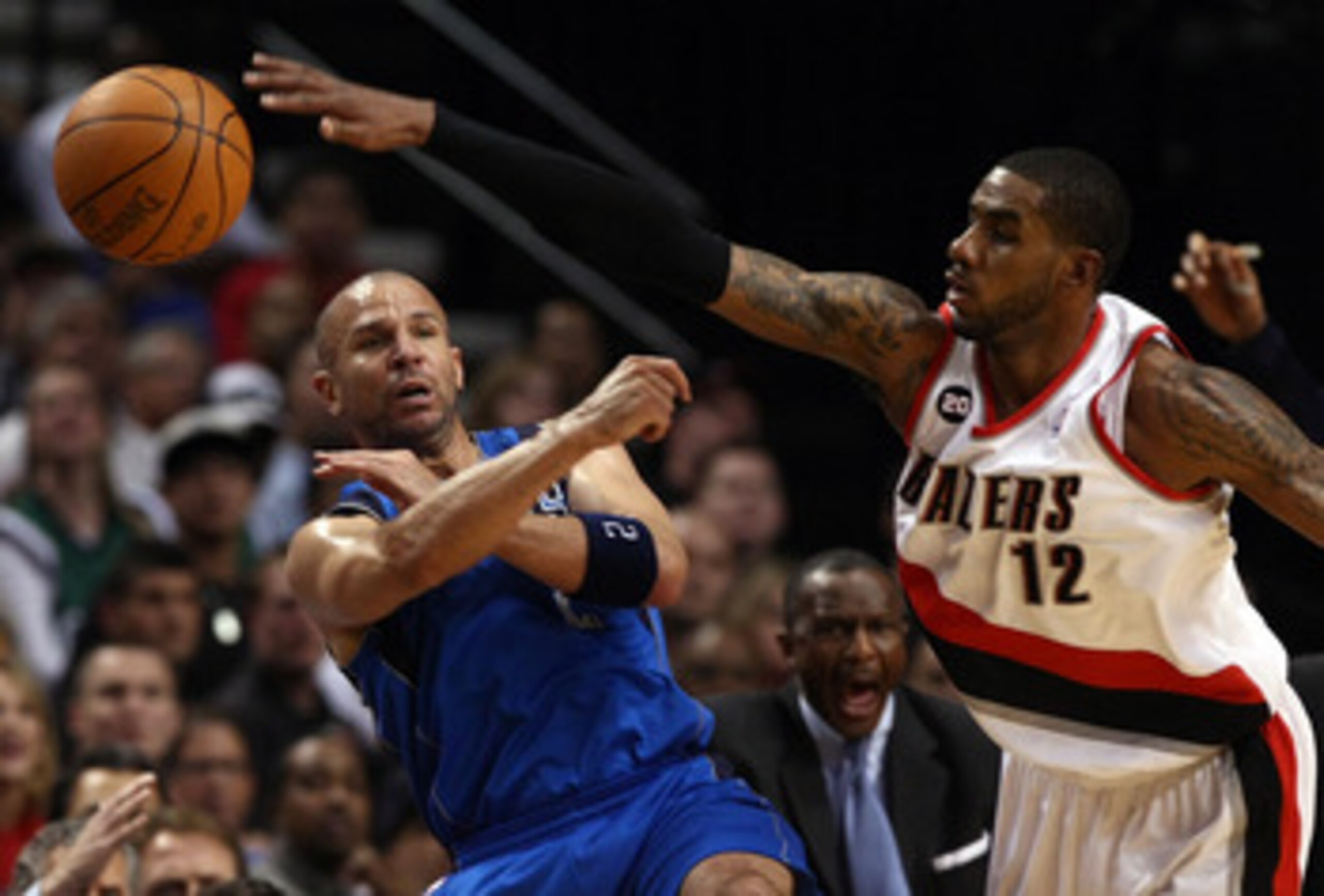 PORTLAND, OR - APRIL 23:  LaMarcus Aldrdige #12 of the Portland Trail Blazers defends Jason Kidd #2 of the Dallas Mavericks in Game Four of the Western Conference Quarterfinals in the 2011 NBA Playoffs on April 23, 2011 at the Rose Garden in Portland, Ore