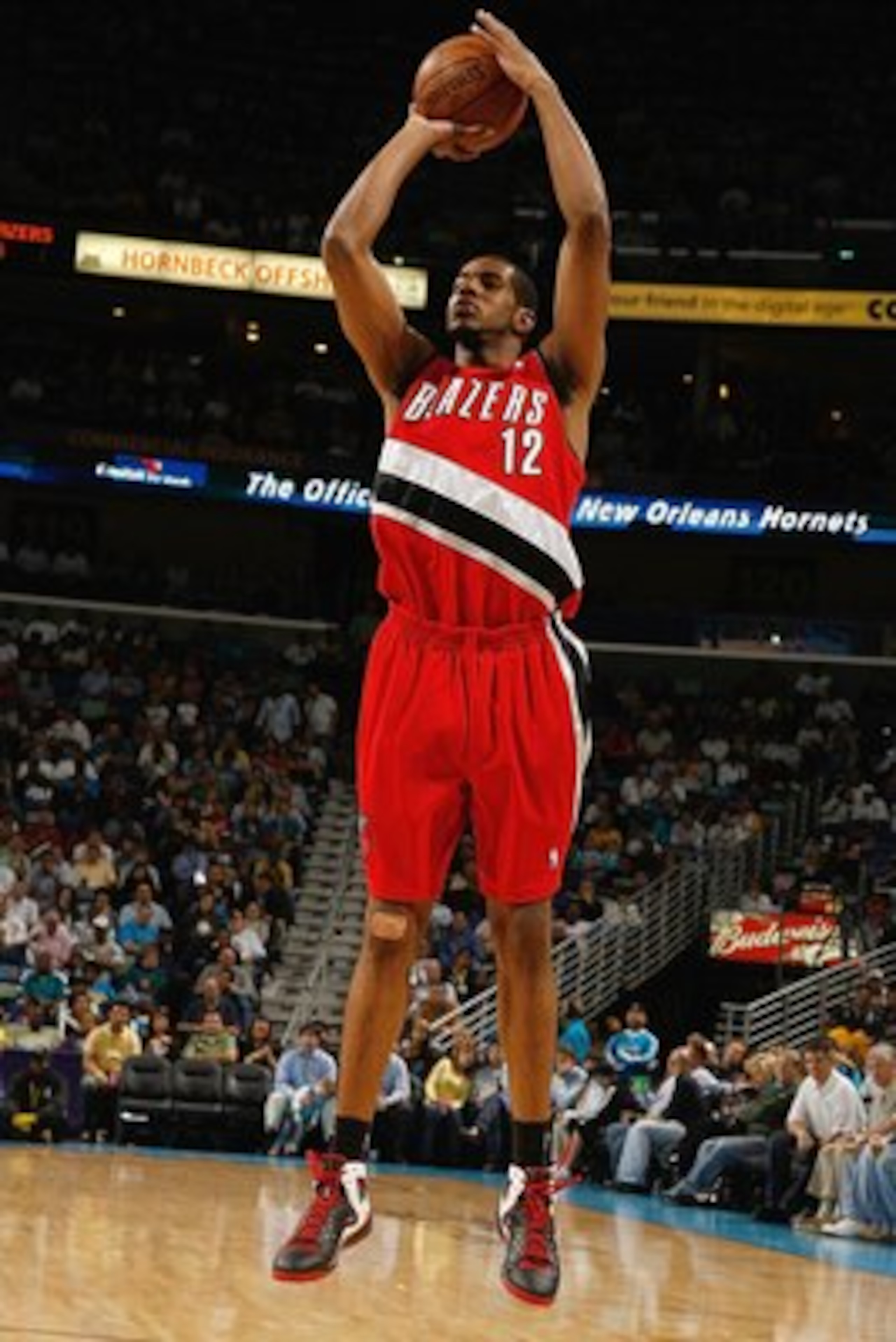 NEW ORLEANS - NOVEMBER 14:  LaMarcus Aldridge #12 of the  Portland Trail Blazers takes a jump shot against the New Orleans Hornets during the game at the New Orleans Arena on November 14, 2008 in New Orleans, Louisiana.  The Hornets defeated the Trail Bla