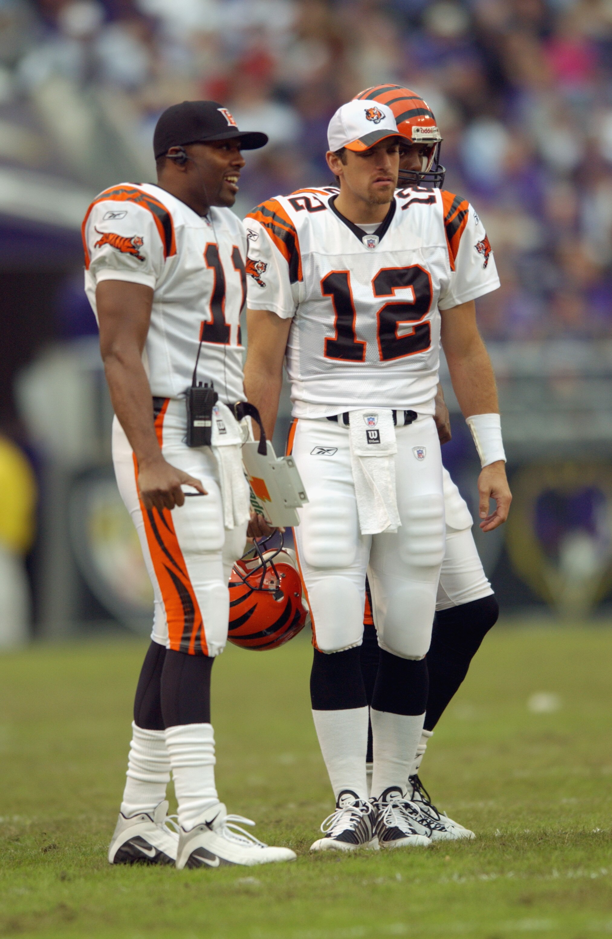 BALTIMORE - NOVEMBER 10:  Quarterback's Gus Frerotte #12 and Akili Smith #11 of the Cincinnati Bengals stand on the field during the NFL game against the Baltimore Ravens at the Ravens Stadium on November 10, 2002 in Baltimore, Maryland.  The Ravens defea