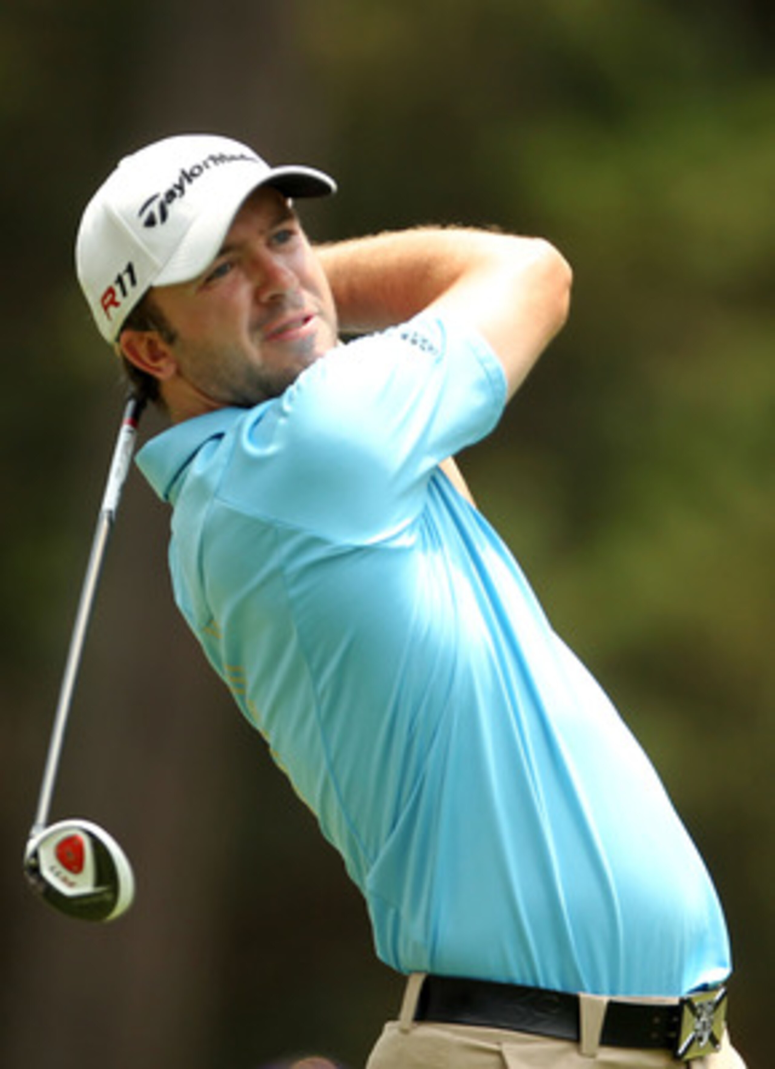 PONTE VEDRA BEACH, FL - MAY 14:  Martin Laird of Scotland watches his tee shot on the sixth hole during the third round of THE PLAYERS Championship held at THE PLAYERS Stadium course at TPC Sawgrass on May 14, 2011 in Ponte Vedra Beach, Florida.  (Photo b