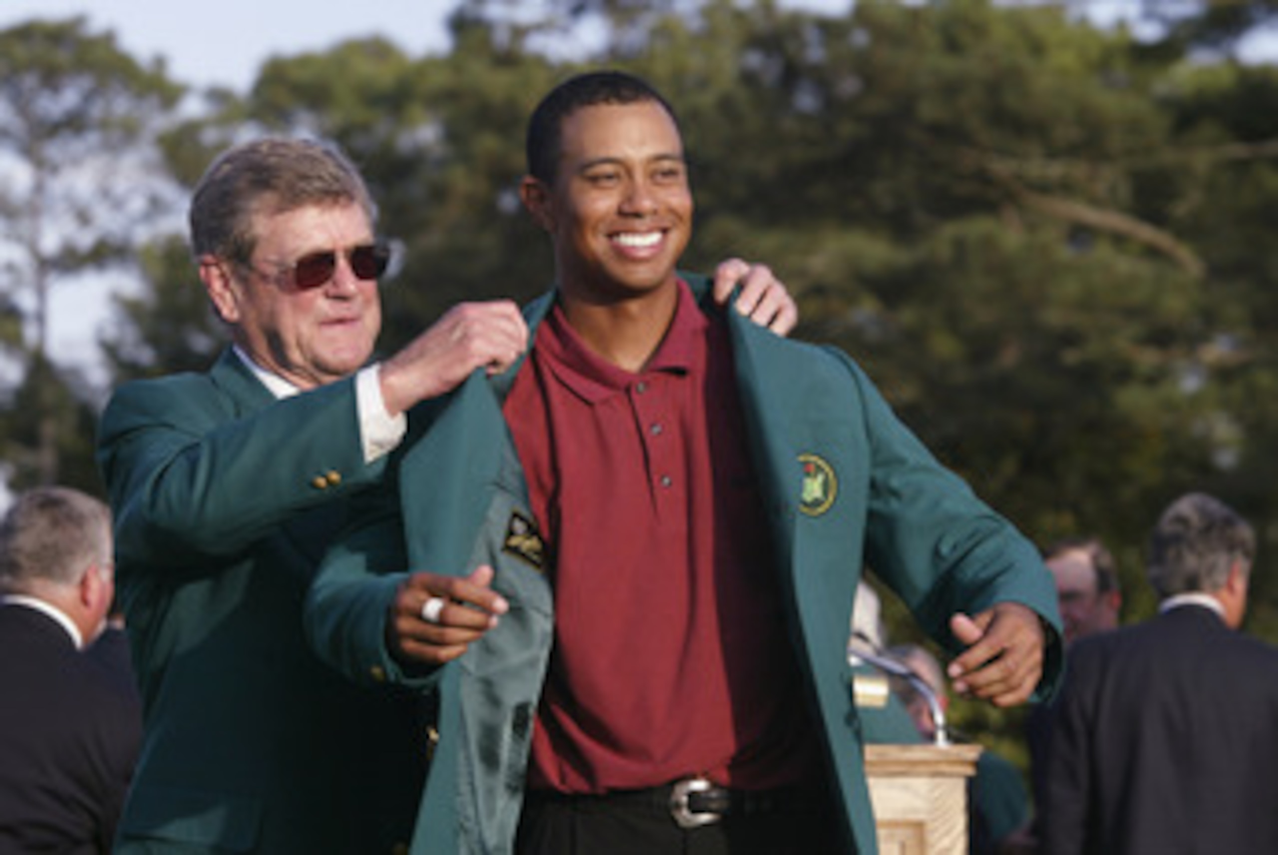 AUGUSTA, GA.- APRIL 14:  Tiger Woods is awarded the green jacket after winning the Masters Tournament at the Augusta National Golf Club on April 14 , 2002 in Augusta, Georgia. DIGITAL IMAGE. EDITORIAL USE ONLY (Photo by Andrew Redington/Getty Images)