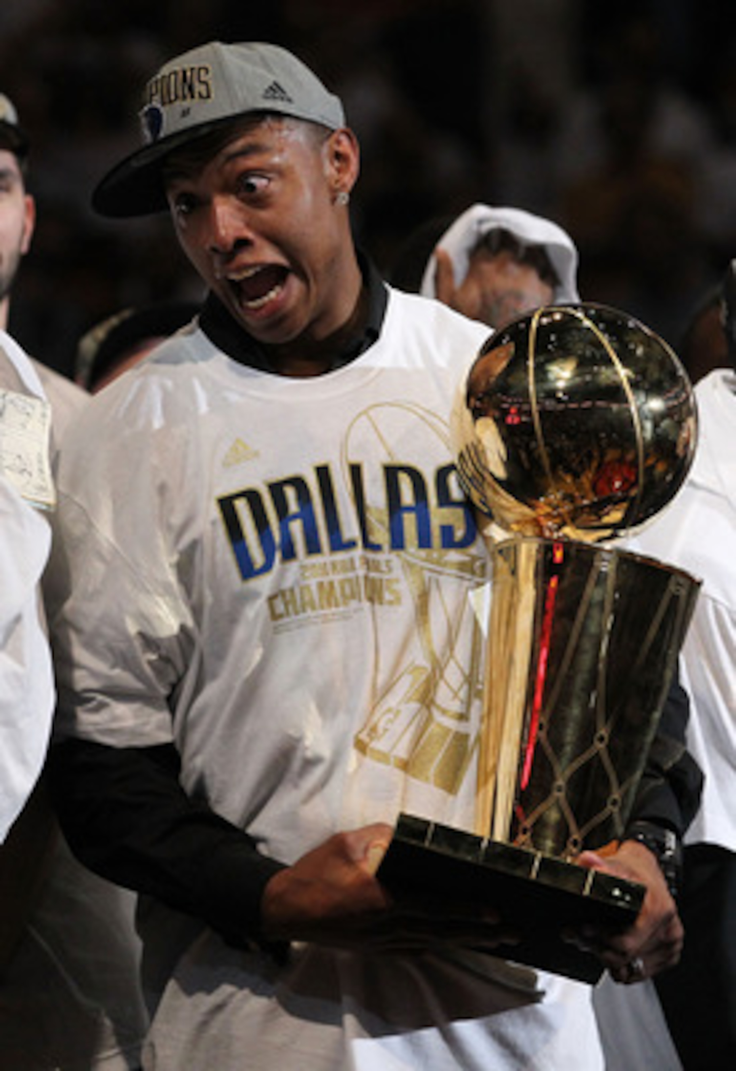 MIAMI, FL - JUNE 12: Caron Butler of the Dallas Mavericks celebrates with the Larry O'Brien trophy after the Mavericks won 105-95 against the Miami Heat in Game Six of the 2011 NBA Finals at American Airlines Arena on June 12, 2011 in Miami, Florida. NOT MIAMI, FL - JUNE 12: Caron Butler of the Dallas Mavericks celebrates with the Larry O'Brien trophy after the Mavericks won 105-95 against the Miami Heat in Game Six of the 2011 NBA Finals at American Airlines Arena on June 12, 2011 in Miami, Florida. NOT