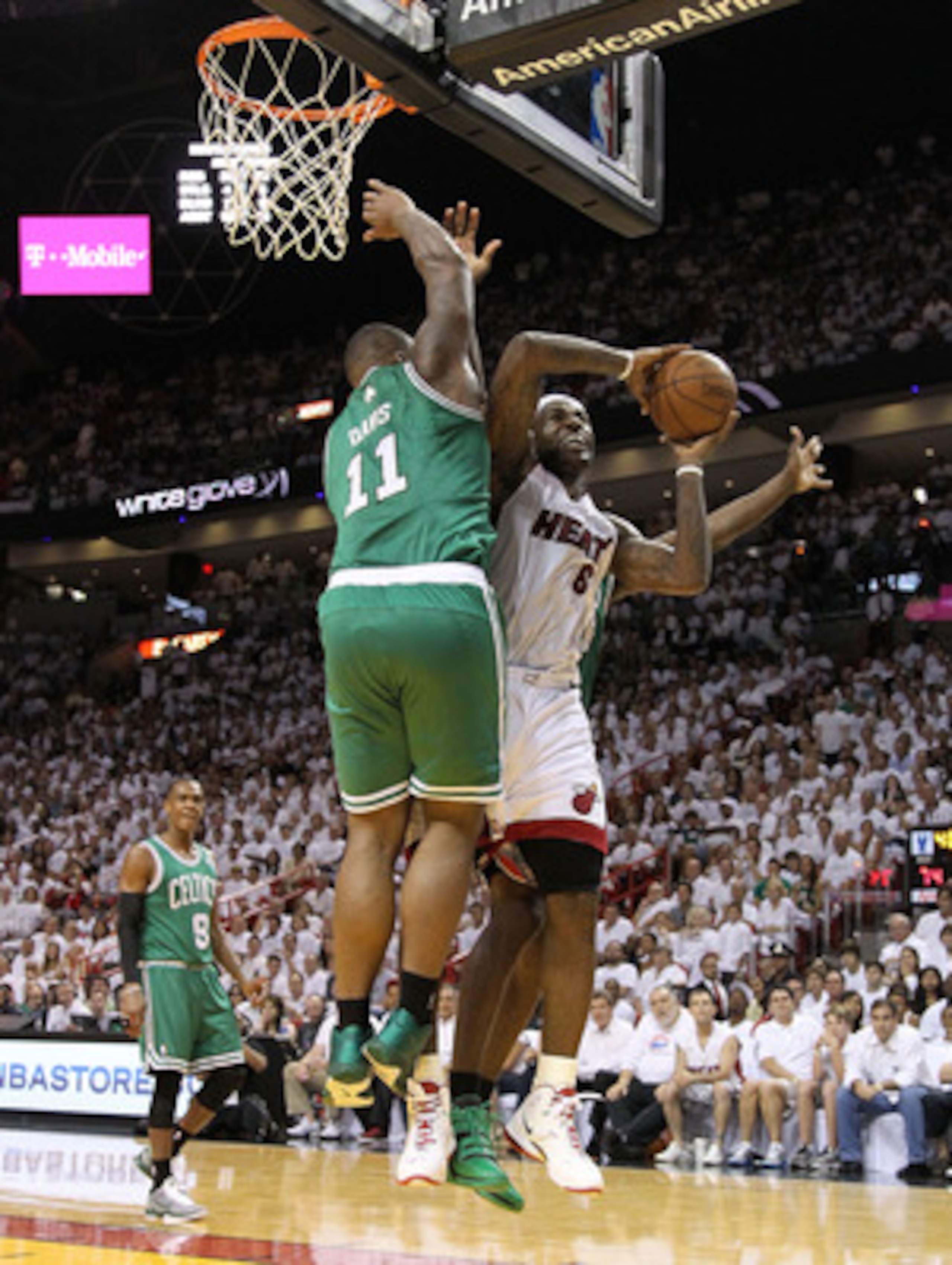 MIAMI, FL - MAY 01: LeBron James #6 of the Miami Heat is fouled by Glen Davis #11 of the Boston Celtics during Game One of the Eastern Conference Semifinals of the 2011 NBA Playoffs at American Airlines Arena on May 1, 2011 in Miami, Florida. NOTE TO USE MIAMI, FL - MAY 01: LeBron James #6 of the Miami Heat is fouled by Glen Davis #11 of the Boston Celtics during Game One of the Eastern Conference Semifinals of the 2011 NBA Playoffs at American Airlines Arena on May 1, 2011 in Miami, Florida. NOTE TO USE