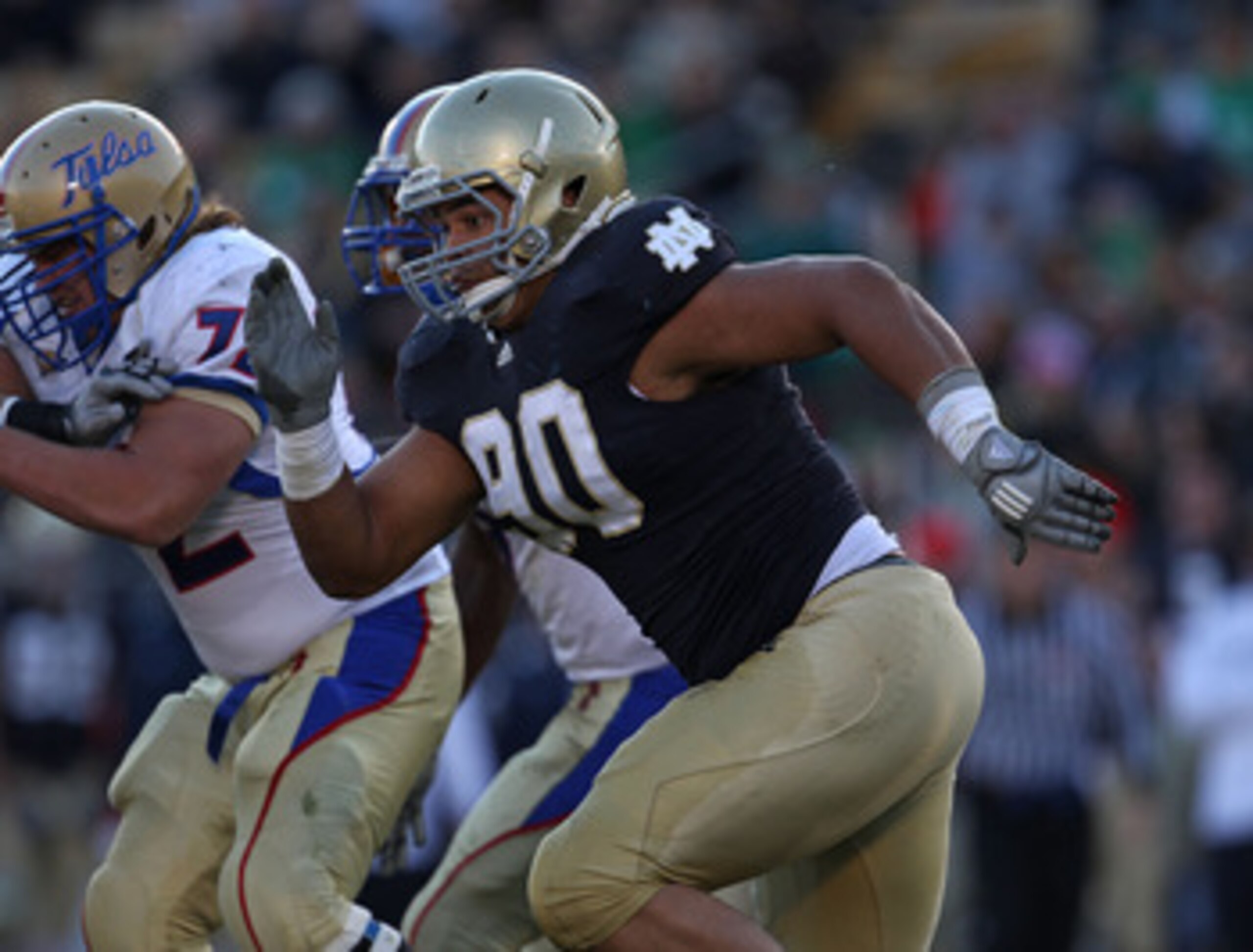 SOUTH BEND, IN - OCTOBER 30: Ethan Johnson #90 of the Notre Dame Fighting Irish pursues a runner against the Tulsa Golden Hurricane at Notre Dame Stadium on October 30, 2010 in South Bend, Indiana. Tulsa defeated Notre Dame 28-27. (Photo by Jonathan Danie