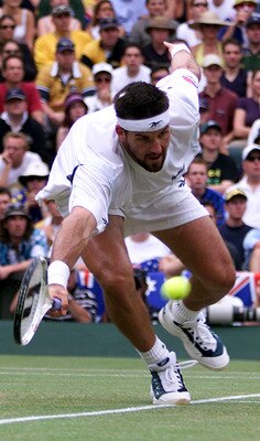9 Jul 2001:  Patrick Rafter of Australia in action against Goran Ivanisevic of Croatia during the Men's Final of The All England Lawn Tennis Championship at Wimbledon, London.  DIGITAL IMAGE Mandatory Credit: Gary M. Prior/ALLSPORT