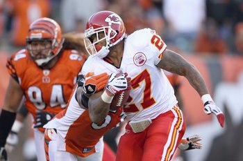 CINCINNATI - DECEMBER 28: Larry Johnson #27 of the Kansas City Chiefscarries the ball as he breaks a tackle during the NFL game against the Cincinnati Bengals on December 28, 2008 at Paul Brown Stadium in Cincinnati, Ohio.  (Photo by Andy Lyons/Getty Imag