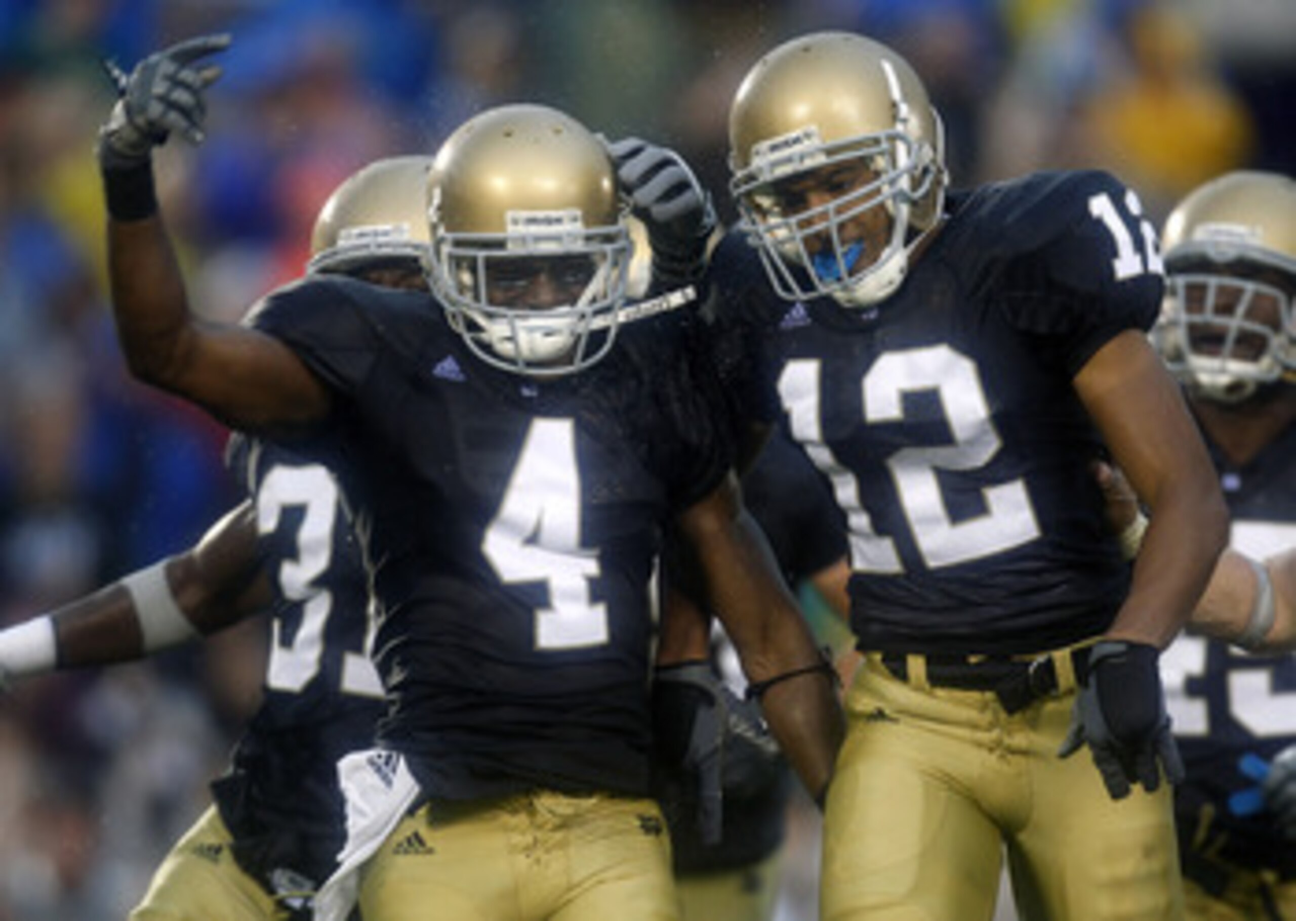 SOUTH BEND, IN - SEPTEMBER 13:  Gary Gray #4 of the Notre Dame Fighting Irish is congratulated by Robert Blanton #12 after a fourth quarter interception while playing the Michigan Wolverines on September 13, 2008 at Notre Dame Stadium in South Bend, India