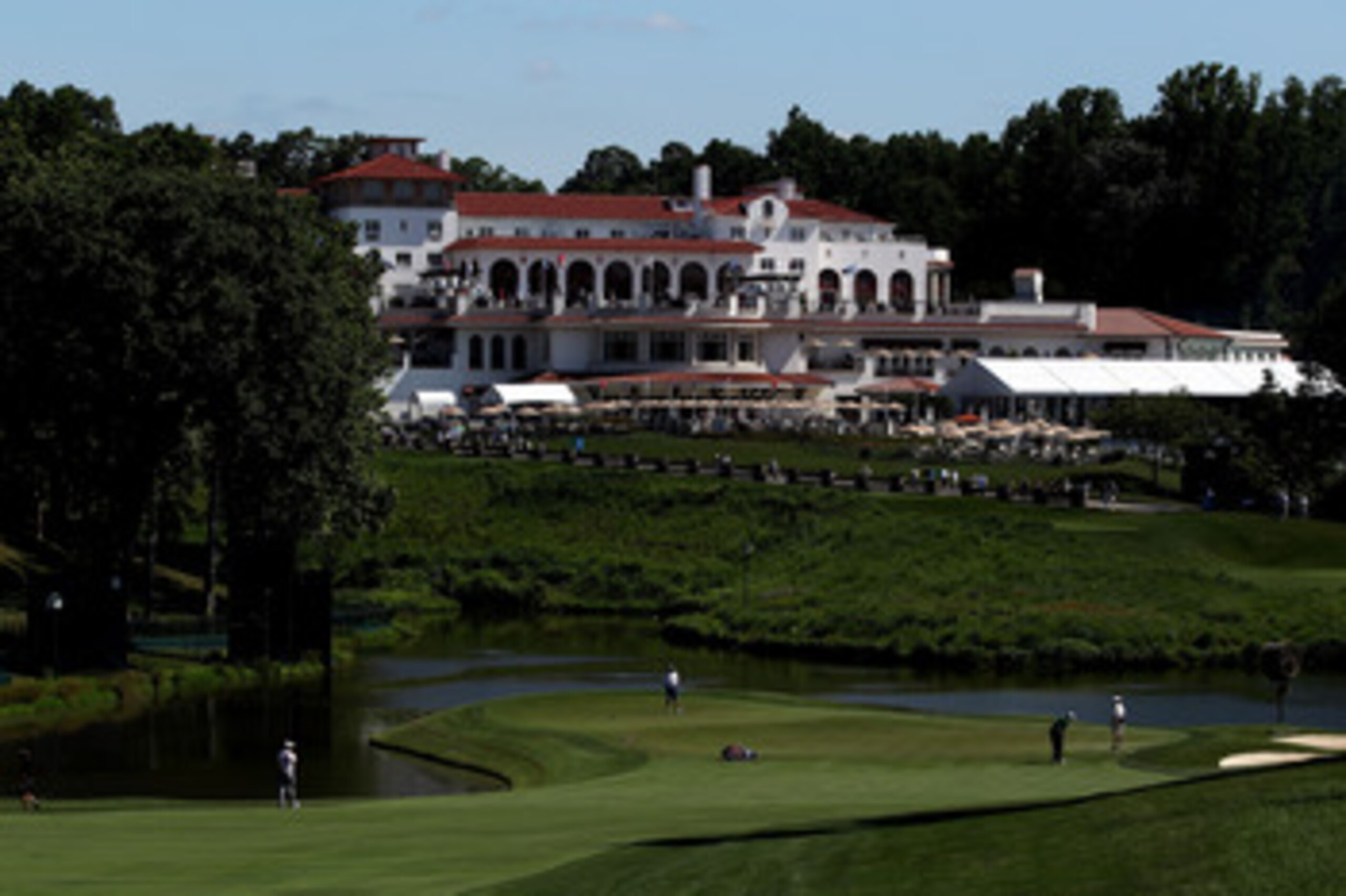 BETHESDA, MD - JUNE 13: Nicolas Colsaerts of Belgium putts in front of the clubhouse during a practice round prior to the start of the 111th U.S. Open at Congressional Country Club on June 13, 2011 in Bethesda, Maryland. (Photo by Andrew Redington/Gett BETHESDA, MD - JUNE 13: Nicolas Colsaerts of Belgium putts in front of the clubhouse during a practice round prior to the start of the 111th U.S. Open at Congressional Country Club on June 13, 2011 in Bethesda, Maryland. (Photo by Andrew Redington/Gett