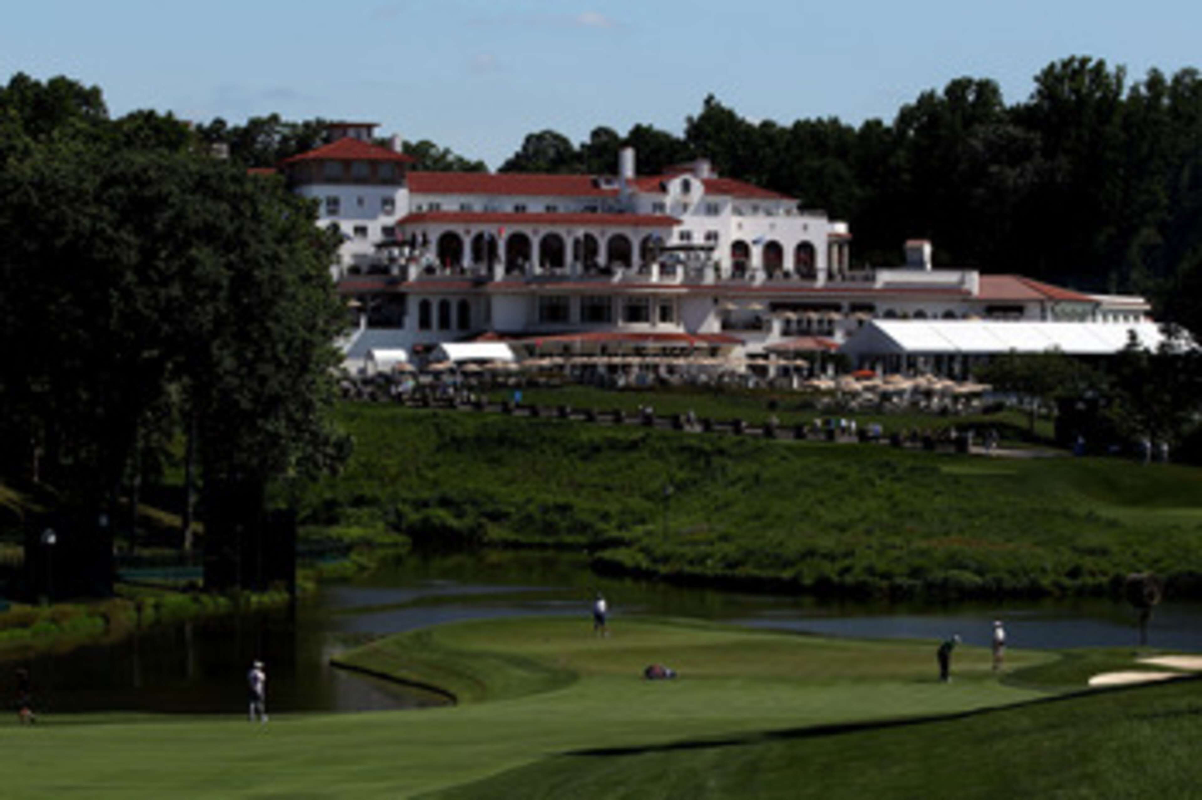 BETHESDA, MD - JUNE 13:   Nicolas Colsaerts of Belgium putts in front of the clubhouse during a practice round prior to the start of the 111th U.S. Open at Congressional Country Club on June 13, 2011 in Bethesda, Maryland.  (Photo by Andrew Redington/Gett