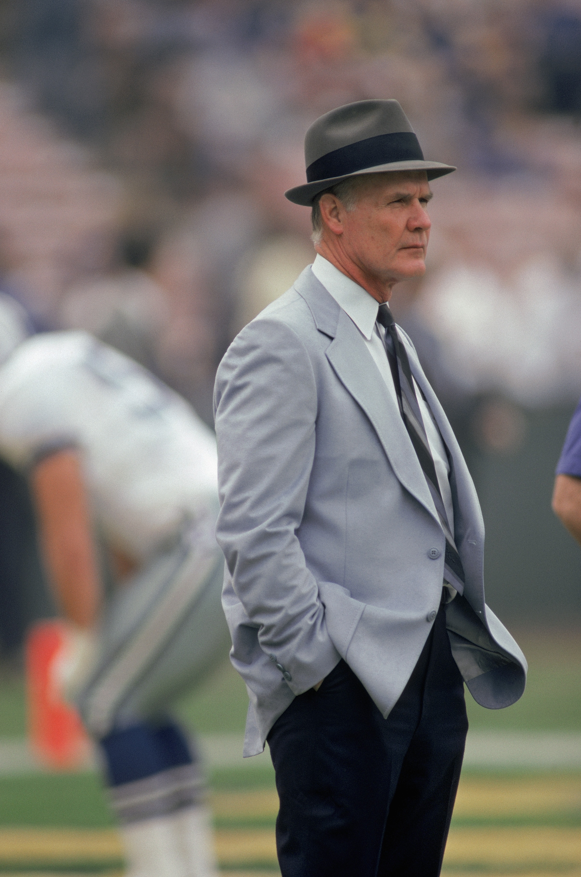 1986:  Head coach Tom Landry of the Dallas Cowboys looks on from the sideline during a 1986 season NFL game.  Tom Landry directed the Dallas Cowboys to 20 consecutive winning seasons from 1966-85, retiring after the 1988 season.  (Photo by Stephen Dunn/Ge