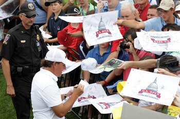 BETHESDA, MD - JUNE 14:  Phil Mickelson signs autographs for fans during a practice round prior to the start of the 111th U.S. Open at Congressional Country Club on June 14, 2011 in Bethesda, Maryland.  (Photo by Ross Kinnaird/Getty Images)