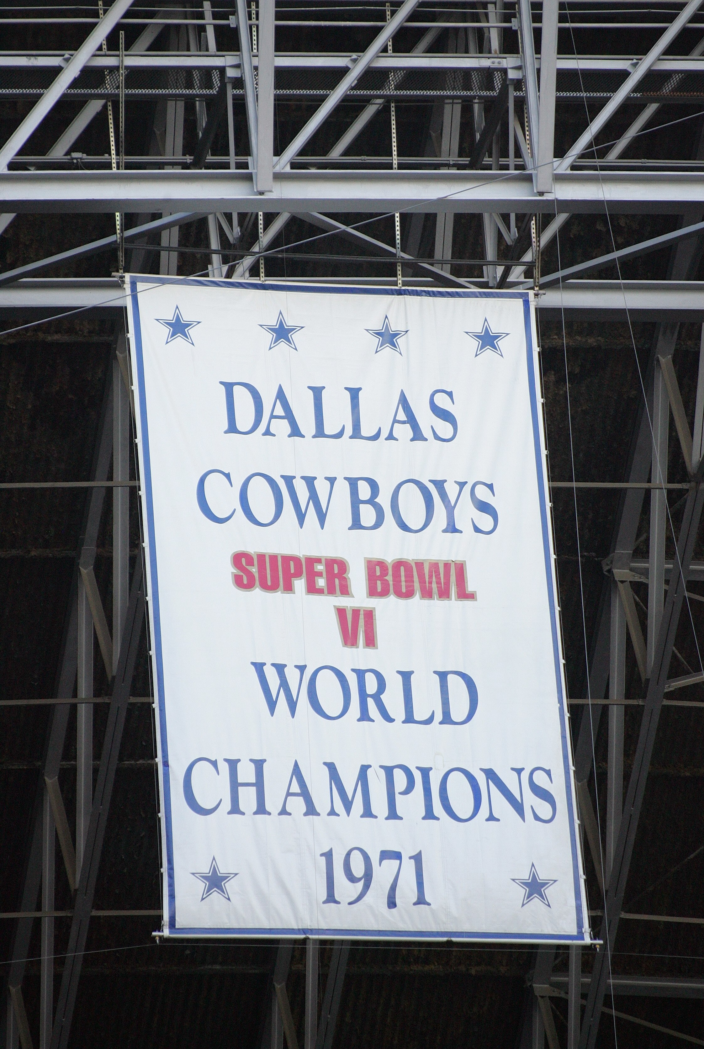 IRVING, TX - NOVEMBER 20:  A banner hangs from the rafters commemorating the 1971 Dallas Cowboys as Super Bowl VI Champions during the game between the Detroit Lions and the Dallas Cowboys on November 20, 2005 at Texas Stadium in Irving, Texas.  The Cowbo