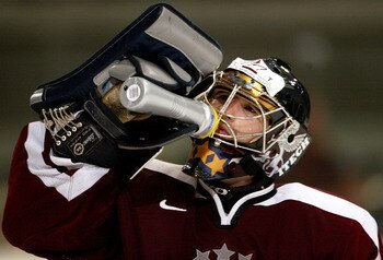 INNSBRUCK, AUSTRIA - MAY 10:  Goalkeeper Arturs Irbe #1 of Latvia takes a drink during the game against Sweden in the IIHF World Men's Championships group F qualifying game at the Olympic Hall on May 10, 2005 in Innsbruck, Austria.  (Photo by Jeff Gross/G