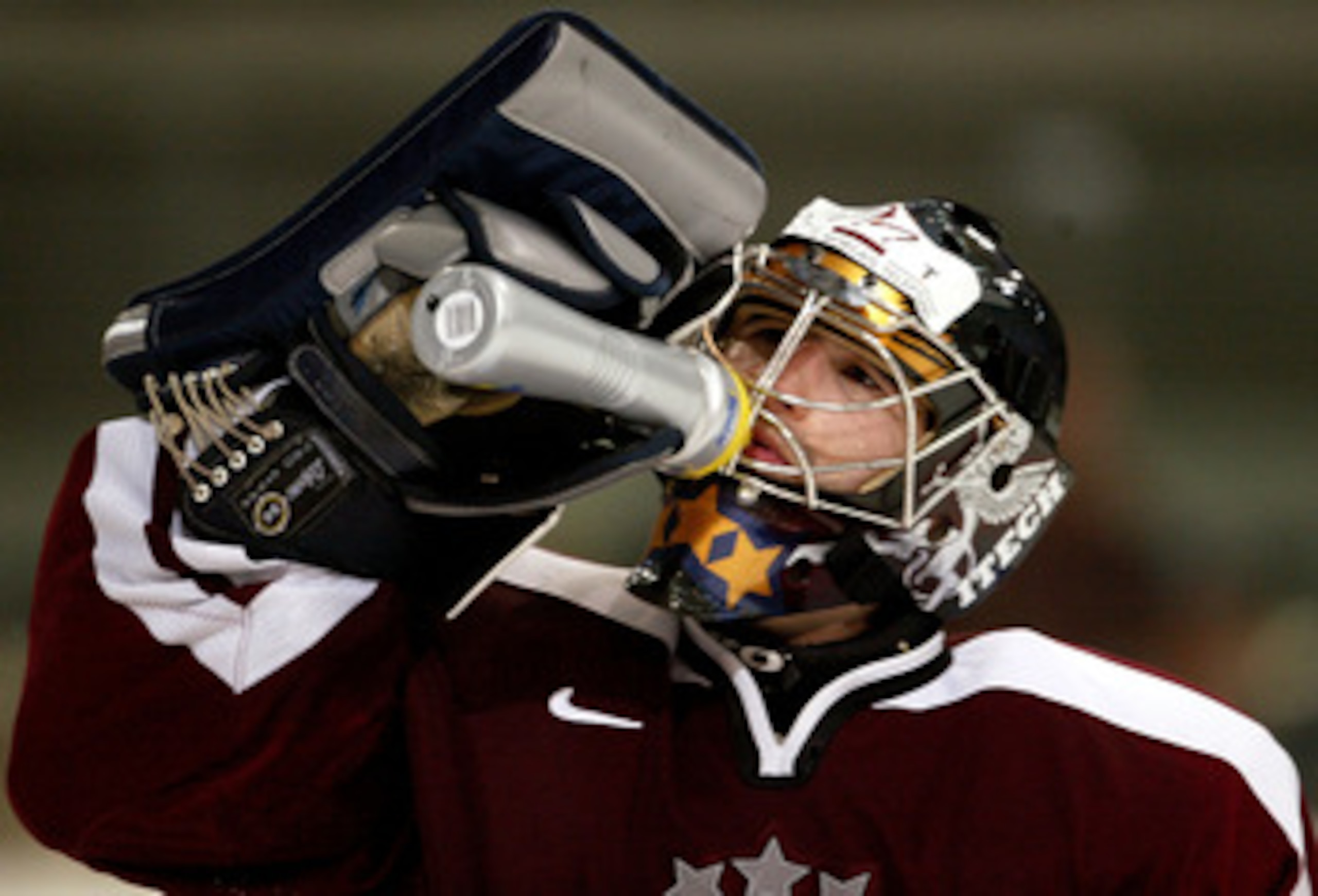 INNSBRUCK, AUSTRIA - MAY 10:  Goalkeeper Arturs Irbe #1 of Latvia takes a drink during the game against Sweden in the IIHF World Men's Championships group F qualifying game at the Olympic Hall on May 10, 2005 in Innsbruck, Austria.  (Photo by Jeff Gross/G