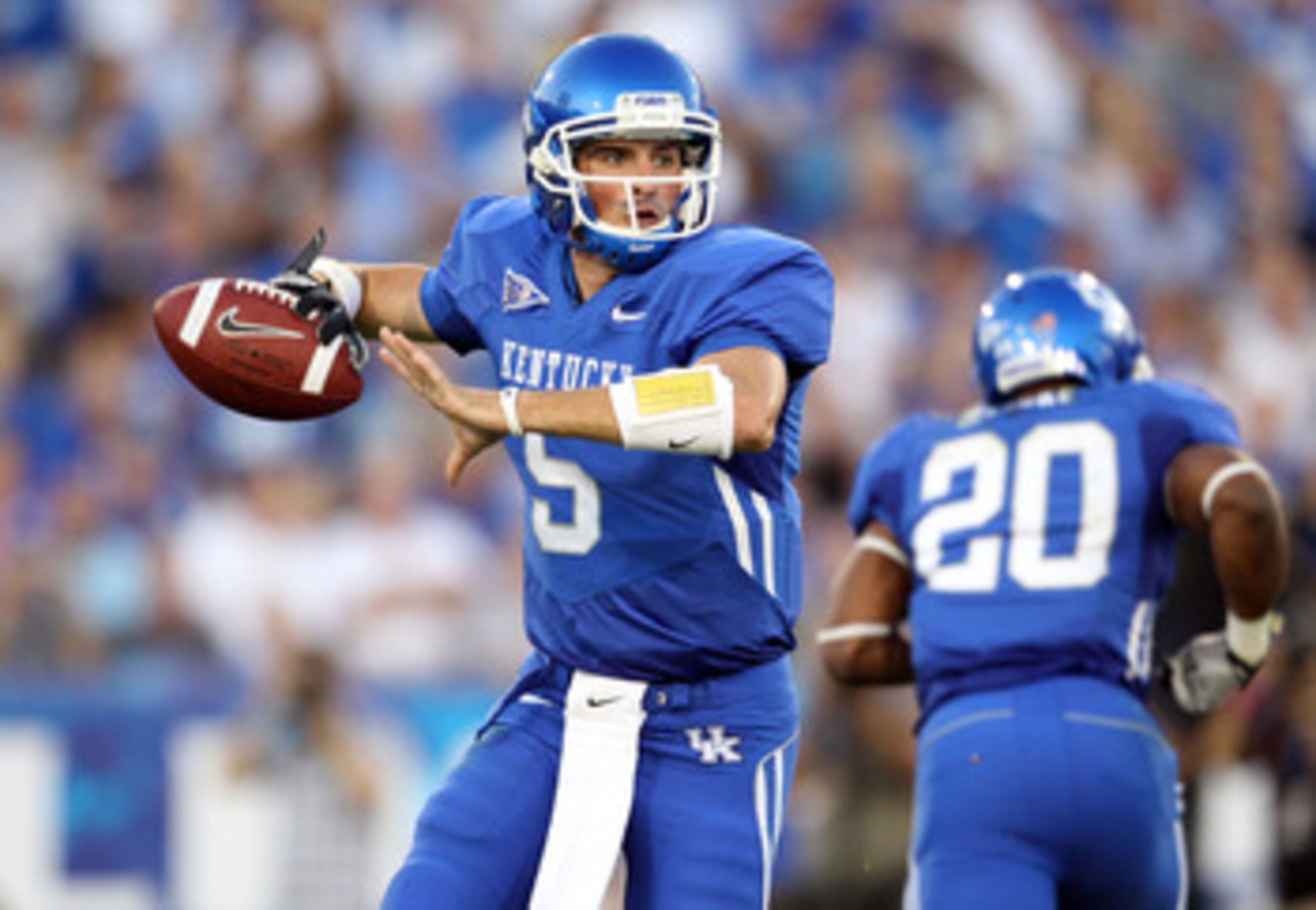 LEXINGTON, KY - SEPTEMBER 18:  Mike Hartline #5 of the Kentucky Wildcats throws a pass during the game against the Akron Zips at Commonwealth Stadium on September 18, 2010 in Lexington, Kentucky.  (Photo by Andy Lyons/Getty Images)