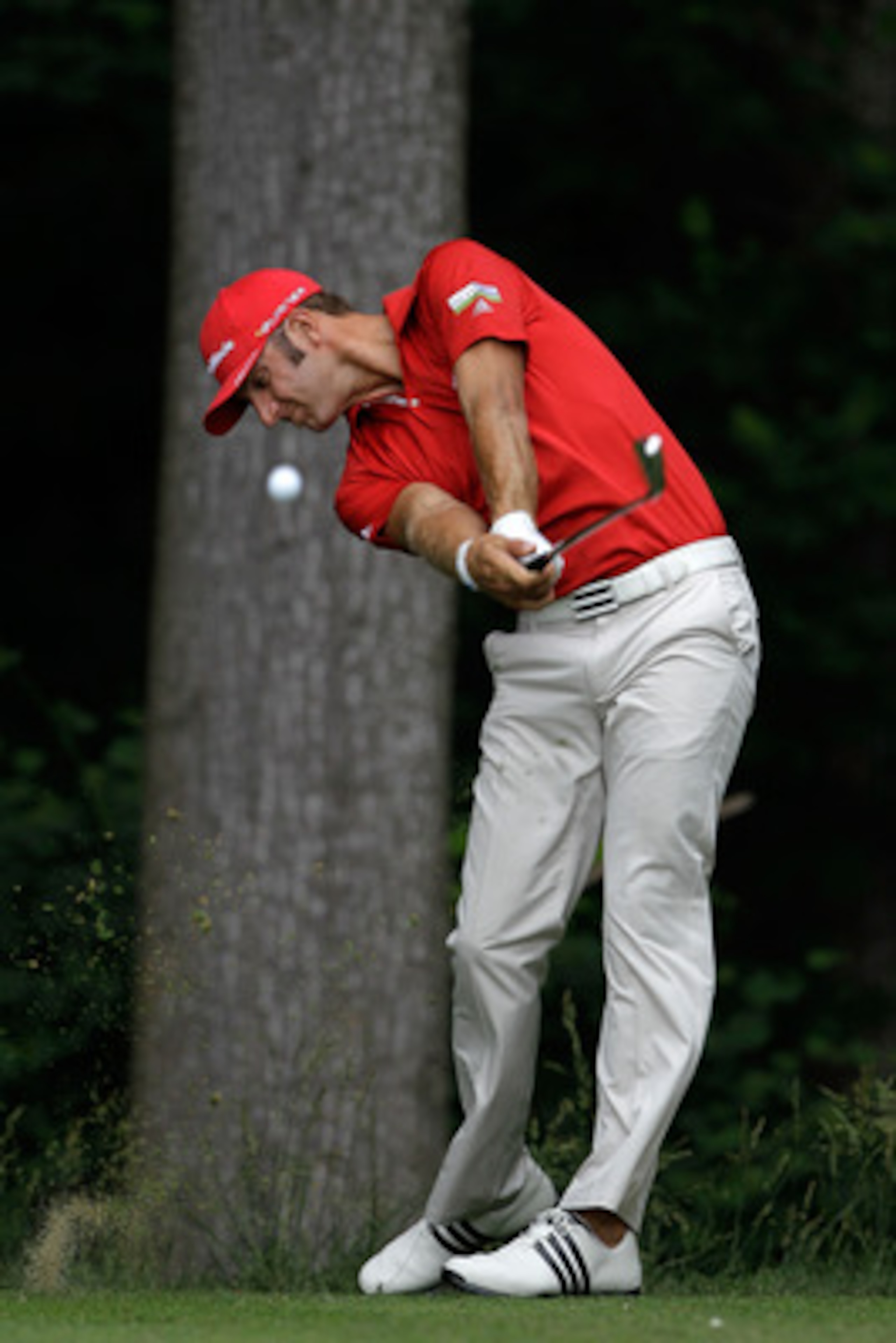BETHESDA, MD - JUNE 14: Dustin Johnson hits a shot during a practice round prior to the start of the 111th U.S. Open at Congressional Country Club on June 14, 2011 in Bethesda, Maryland. (Photo by Rob Carr/Getty Images) BETHESDA, MD - JUNE 14: Dustin Johnson hits a shot during a practice round prior to the start of the 111th U.S. Open at Congressional Country Club on June 14, 2011 in Bethesda, Maryland. (Photo by Rob Carr/Getty Images)