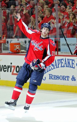 WASHINGTON , DC - APRIL 23:  Brooks Laich #21 of the Washington Capitals celebrates being named the third star of the game against the New York Rangers in Game Five of the Eastern Conference Quarterfinals during the 2011 NHL Stanley Cup Playoffs at the Ve