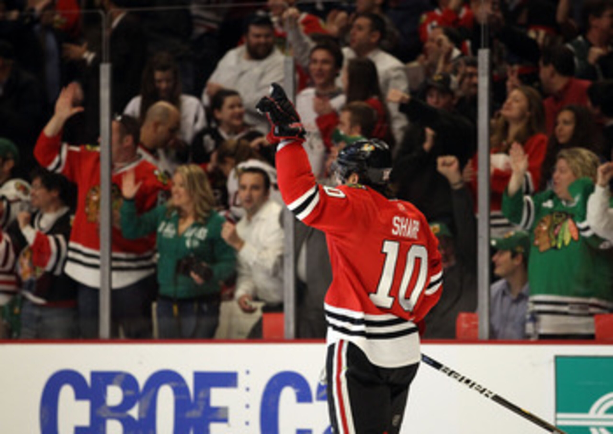 CHICAGO, IL - MARCH 14: Patrick Sharp #10 of the Chicago Blackhawks celebrates a goal scored against the San Jose Sharks at the United Center on March 14, 2011 in Chicago, Illinois. The Blackhawks defeated the Sharks 6-3. (Photo by Jonathan Daniel/Getty I