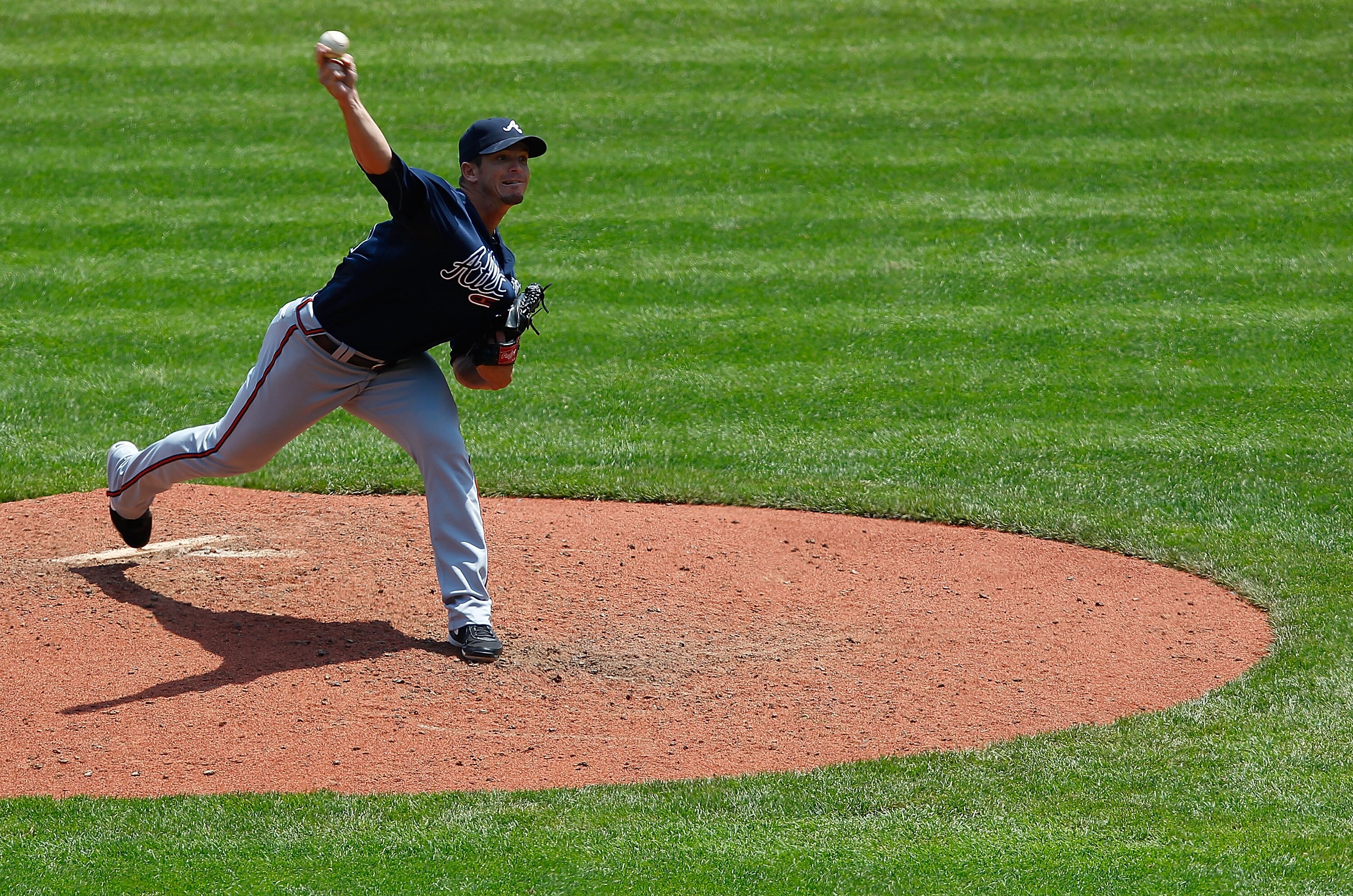 PITTSBURGH - MAY 25:  Scott Proctor #43 of the Atlanta Braves pitches against the Pittsburgh Pirates during the game on May 25, 2011 at PNC Park in Pittsburgh, Pennsylvania.  (Photo by Jared Wickerham/Getty Images)