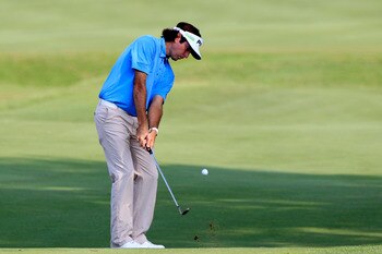 PONTE VEDRA BEACH, FL - MAY 12:  Bubba Watson hits a chip shot on the 16th hole during the first round of THE PLAYERS Championship held at THE PLAYERS Stadium course at TPC Sawgrass on May 12, 2011 in Ponte Vedra Beach, Florida.  (Photo by Sam Greenwood/G