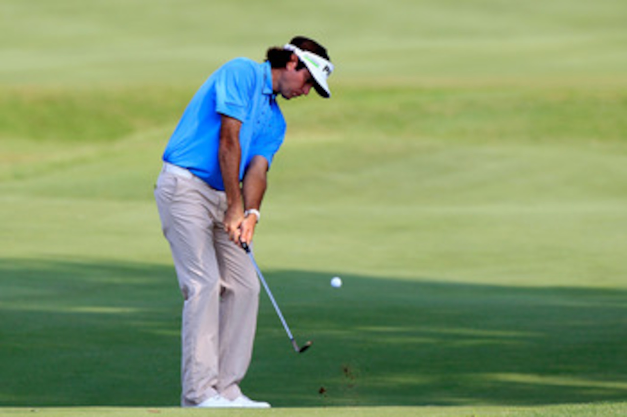 PONTE VEDRA BEACH, FL - MAY 12:  Bubba Watson hits a chip shot on the 16th hole during the first round of THE PLAYERS Championship held at THE PLAYERS Stadium course at TPC Sawgrass on May 12, 2011 in Ponte Vedra Beach, Florida.  (Photo by Sam Greenwood/G