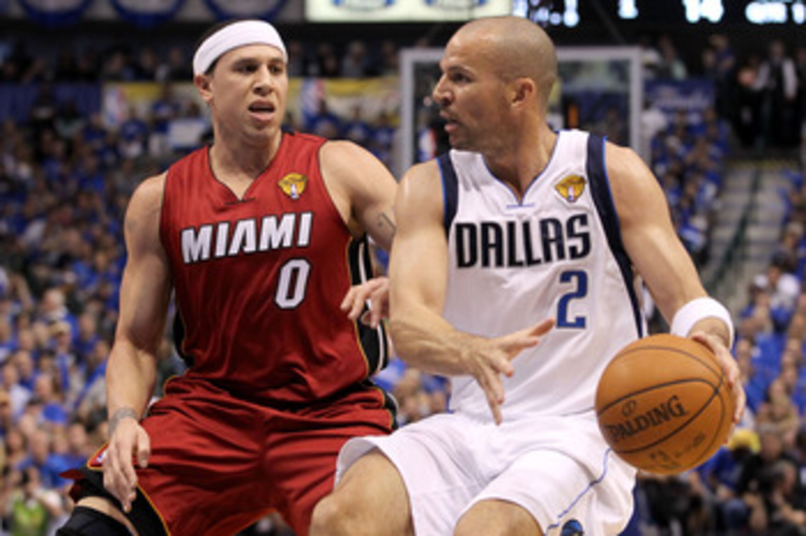 DALLAS, TX - JUNE 05:  Jason Kidd #2 of the Dallas Mavericks drives on Mike Bibby #0 of the Miami Heat in the first quarter in Game Three of the 2011 NBA Finals at American Airlines Center on June 5, 2011 in Dallas, Texas.  NOTE TO USER: User expressly ac