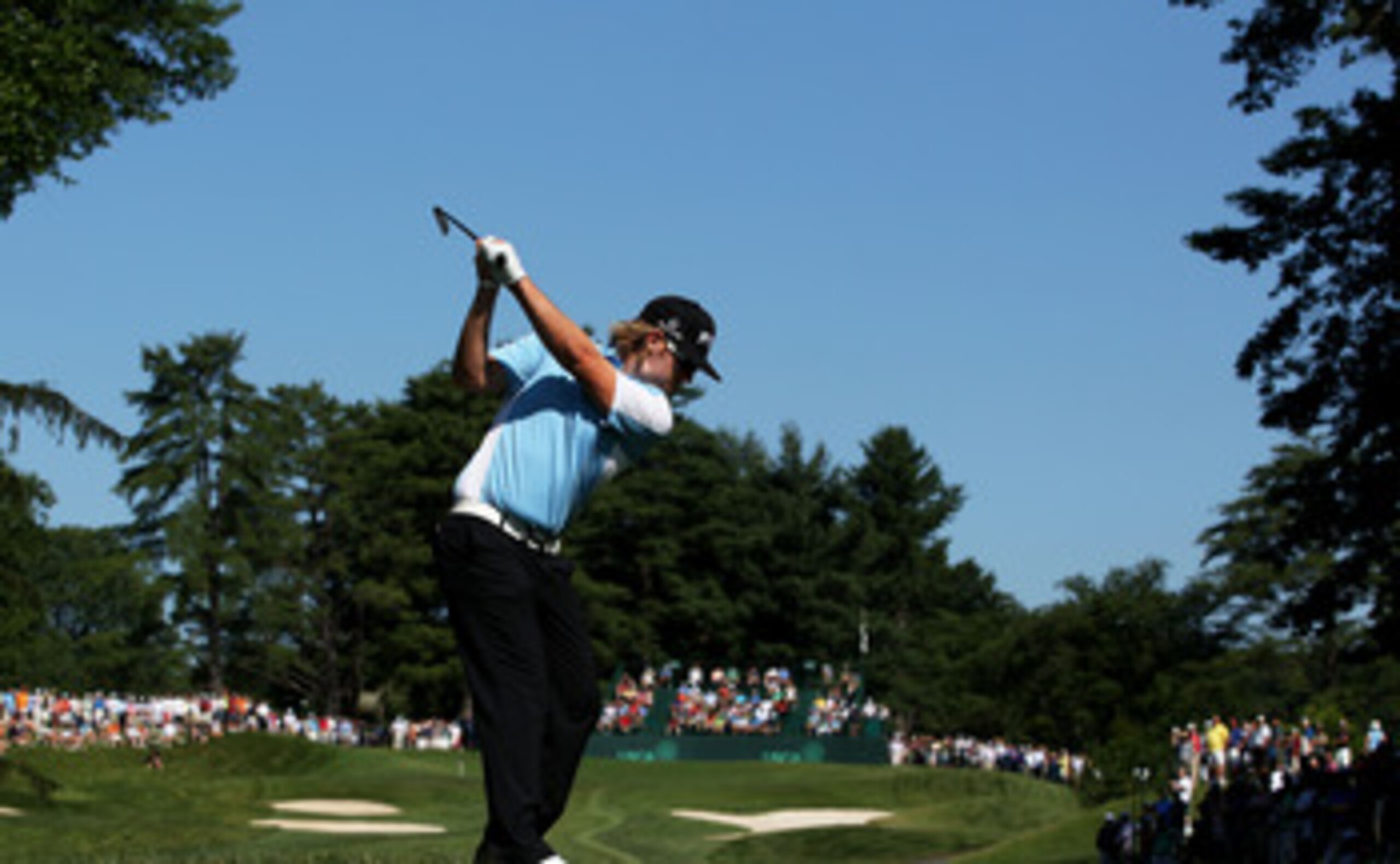 BETHESDA, MD - JUNE 14:   Hunter Mahan hits a shot during a practice round prior to the start of the 111th U.S. Open at Congressional Country Club on June 14, 2011 in Bethesda, Maryland.  (Photo by Andrew Redington/Getty Images)