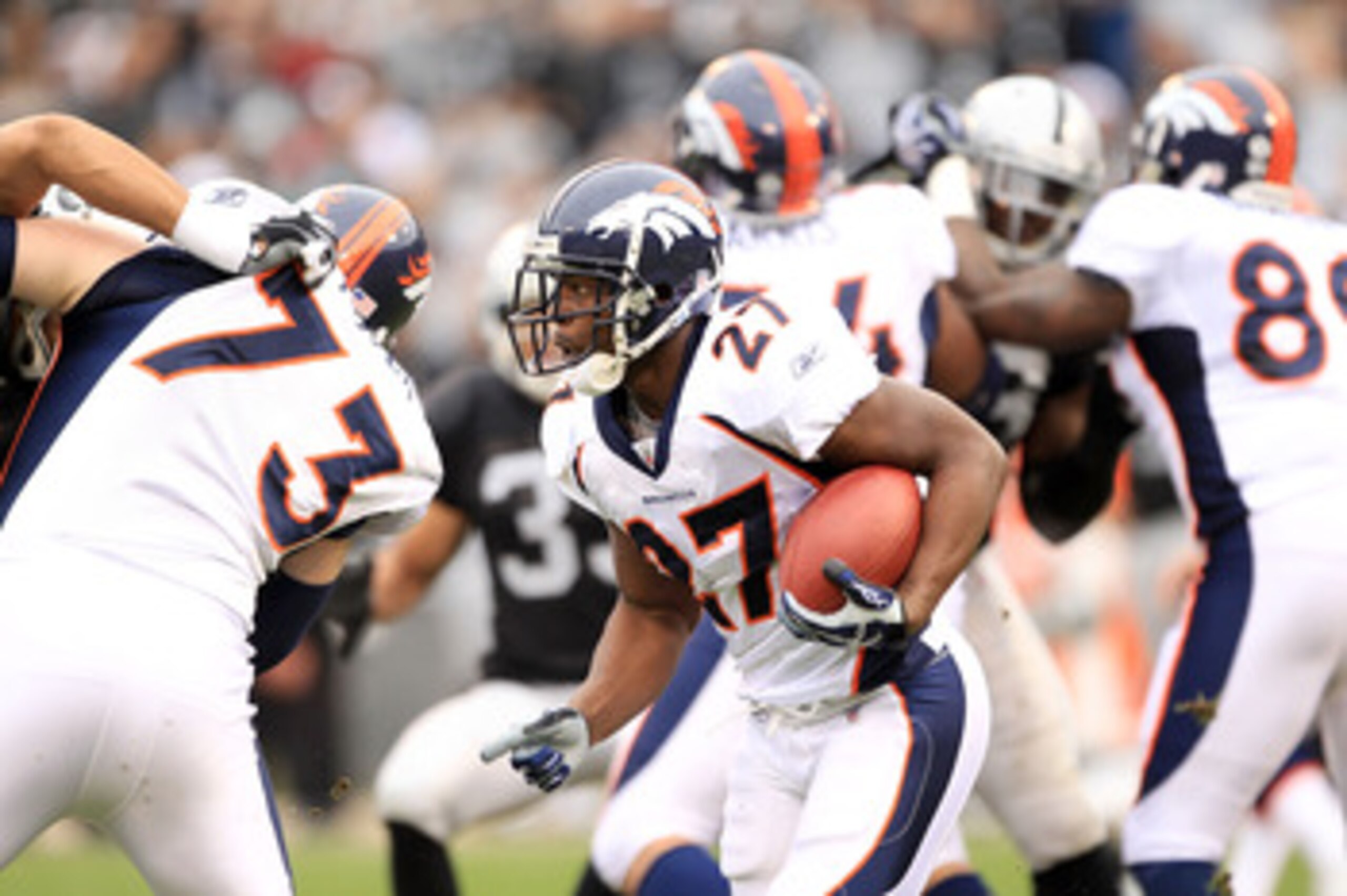 OAKLAND, CA - DECEMBER 19:  Knowshon Moreno #27 of the Denver Broncos runs with the ball during their game against the Oakland Raiders at Oakland-Alameda County Coliseum on December 19, 2010 in Oakland, California.  (Photo by Ezra Shaw/Getty Images)