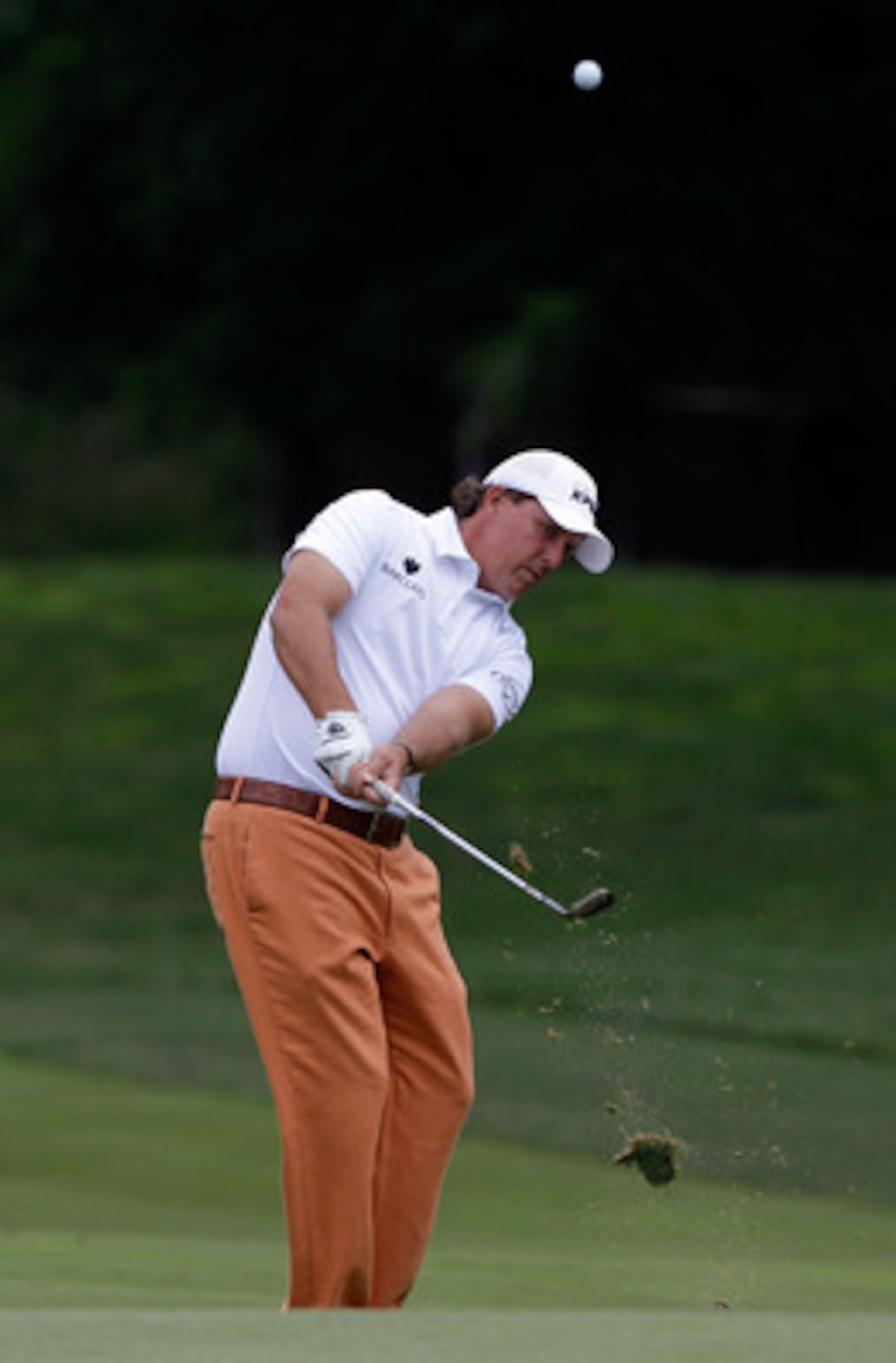BETHESDA, MD - JUNE 14:  Phil Mickelson hits a shot during a practice round prior to the start of the 111th U.S. Open at Congressional Country Club on June 14, 2011 in Bethesda, Maryland.  (Photo by Rob Carr/Getty Images)