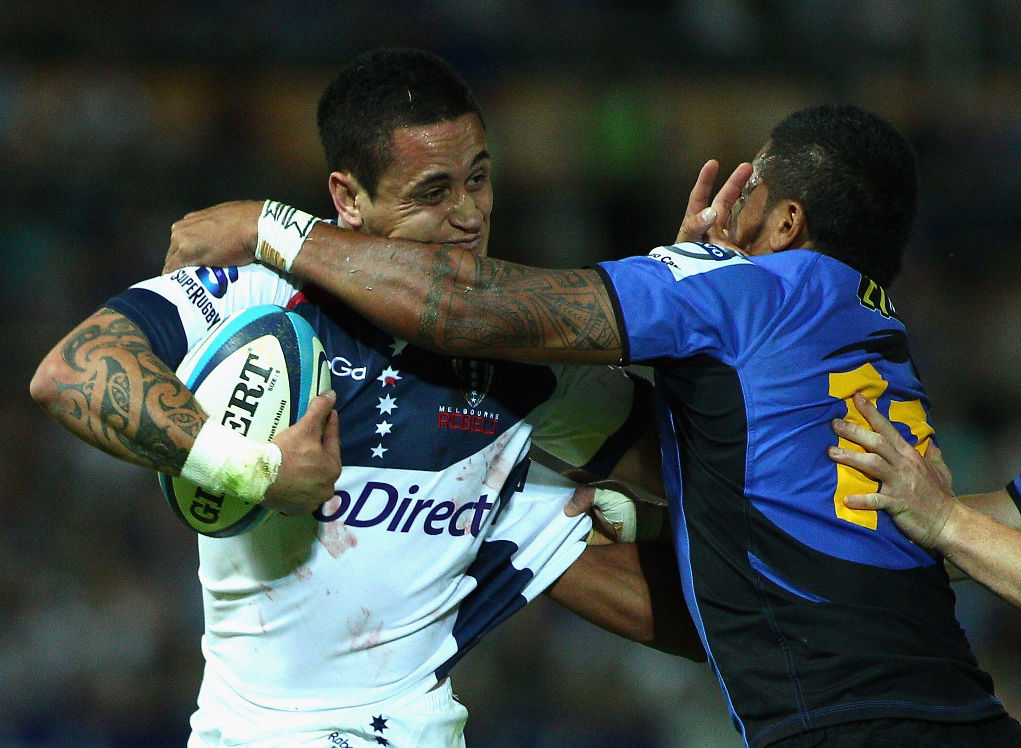 PERTH, AUSTRALIA - APRIL 02: Richard Kingi of the Rebels fends off an opponent during the round seven Super Rugby match between the Western Force and the Melbourne Rebels at nib Stadium on April 2, 2011 in Perth, Australia. (Photo by Mark Dadswell/Gett PERTH, AUSTRALIA - APRIL 02: Richard Kingi of the Rebels fends off an opponent during the round seven Super Rugby match between the Western Force and the Melbourne Rebels at nib Stadium on April 2, 2011 in Perth, Australia. (Photo by Mark Dadswell/Gett